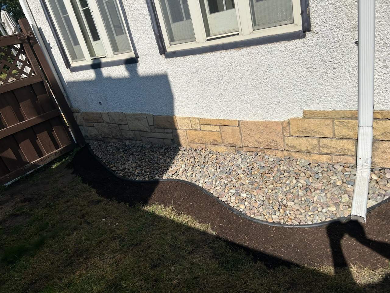 Window Wells & Foundation Grading in South Minneapolis by Waterproofing Northeast
