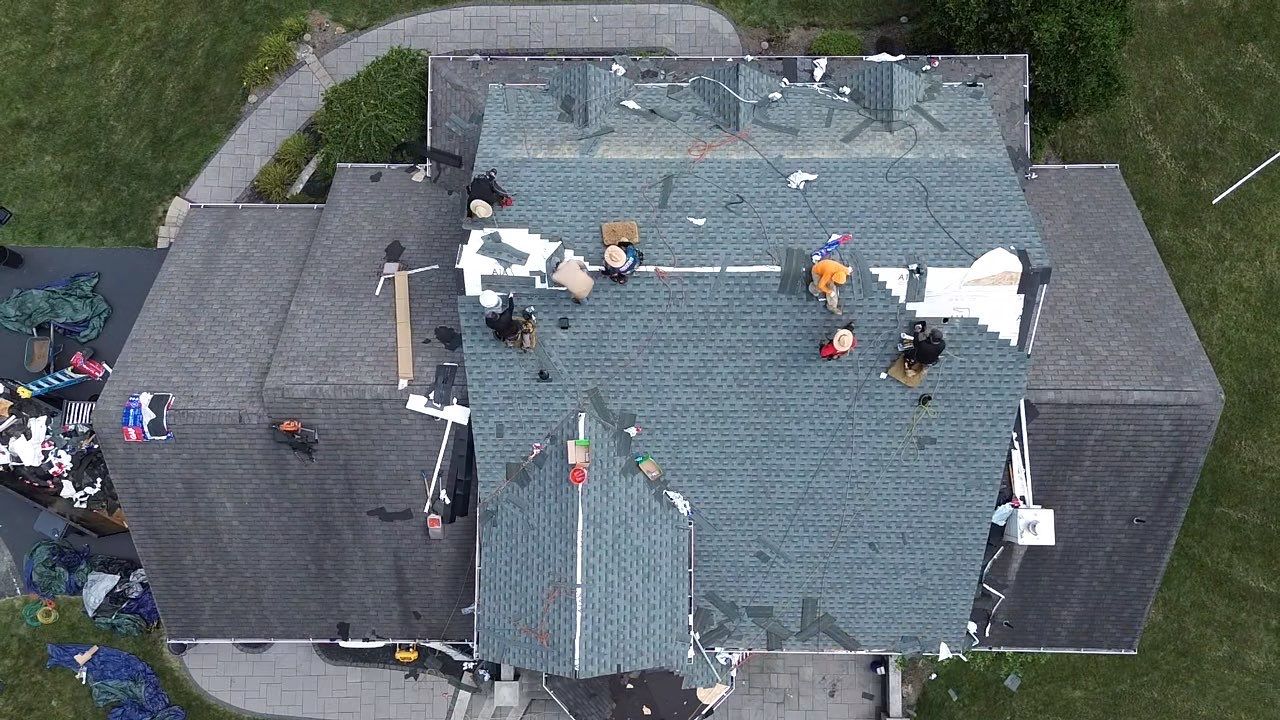 Full Roofing Replacement and Gray Shake Hardie Siding Installation in Butler by Cousins Roofing Siding & Decks