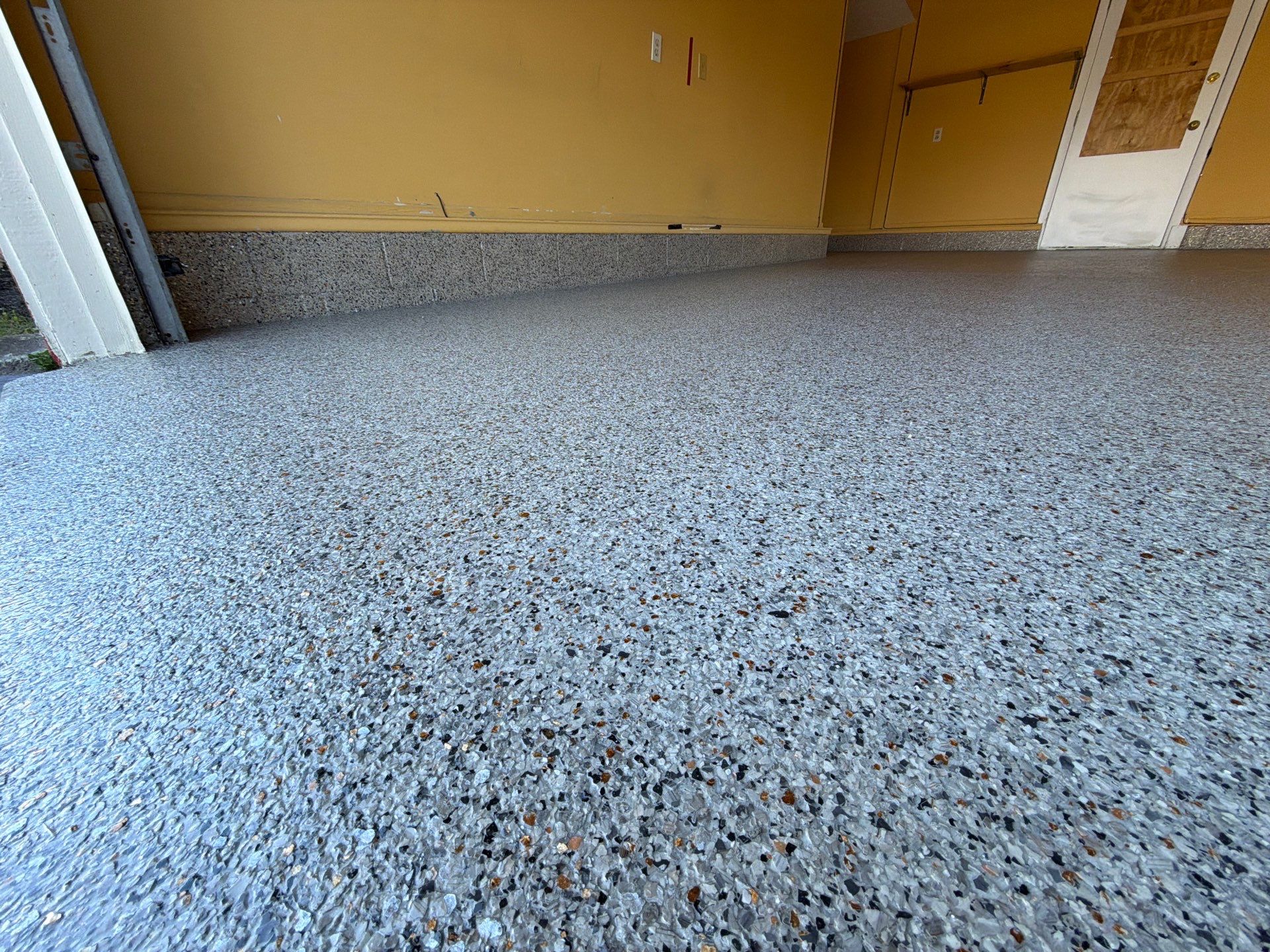 Vintage Goldmine Garage Coating by NG Masonry & Construction LLC