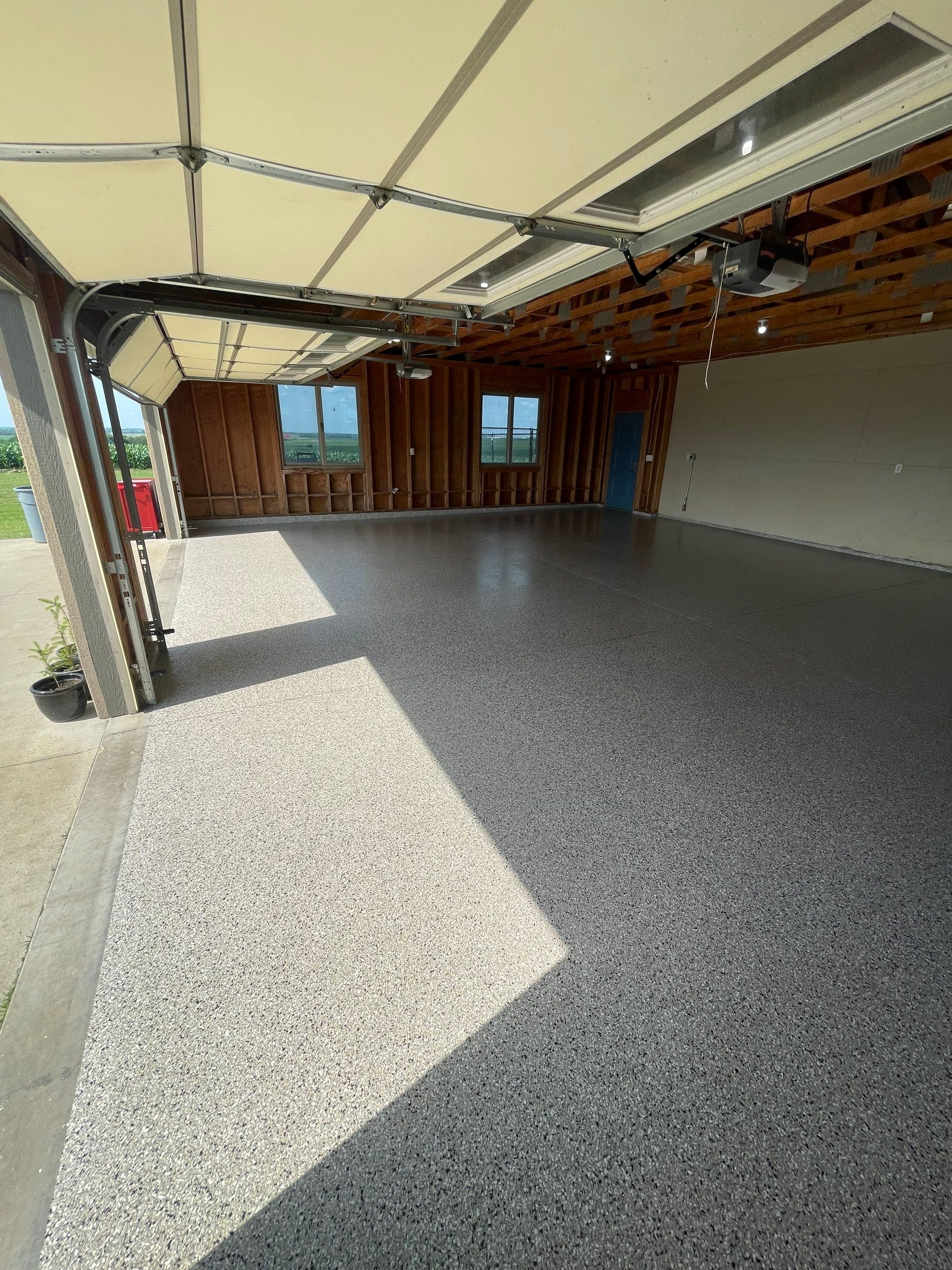 Cabin Fever Coating for Detached Garage in Dell Rapids by Select Painting, Coatings & Garage Cabinets