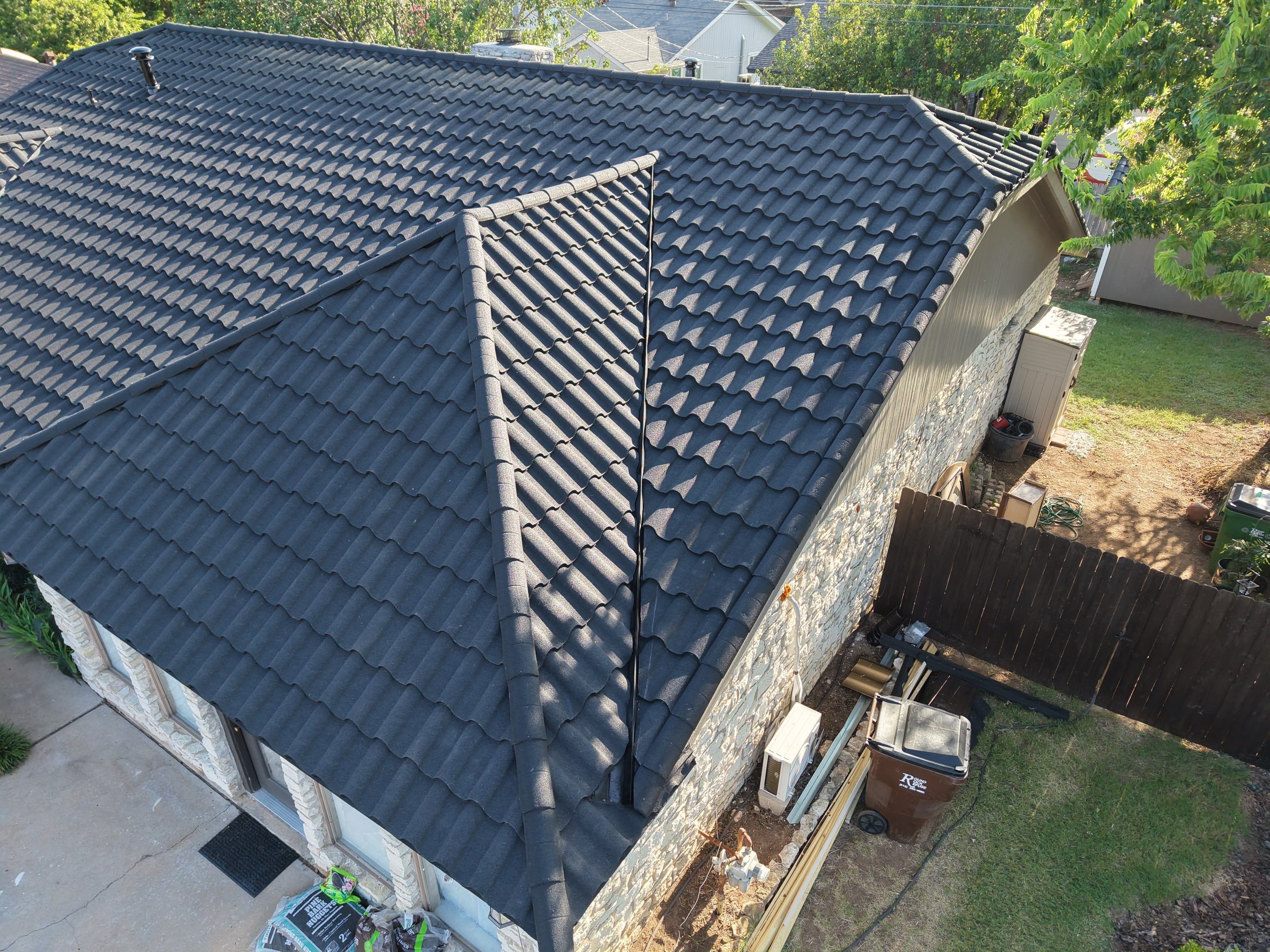 Residential Roof Replacement using Decra Villa Tile by Action Exteriors Austin