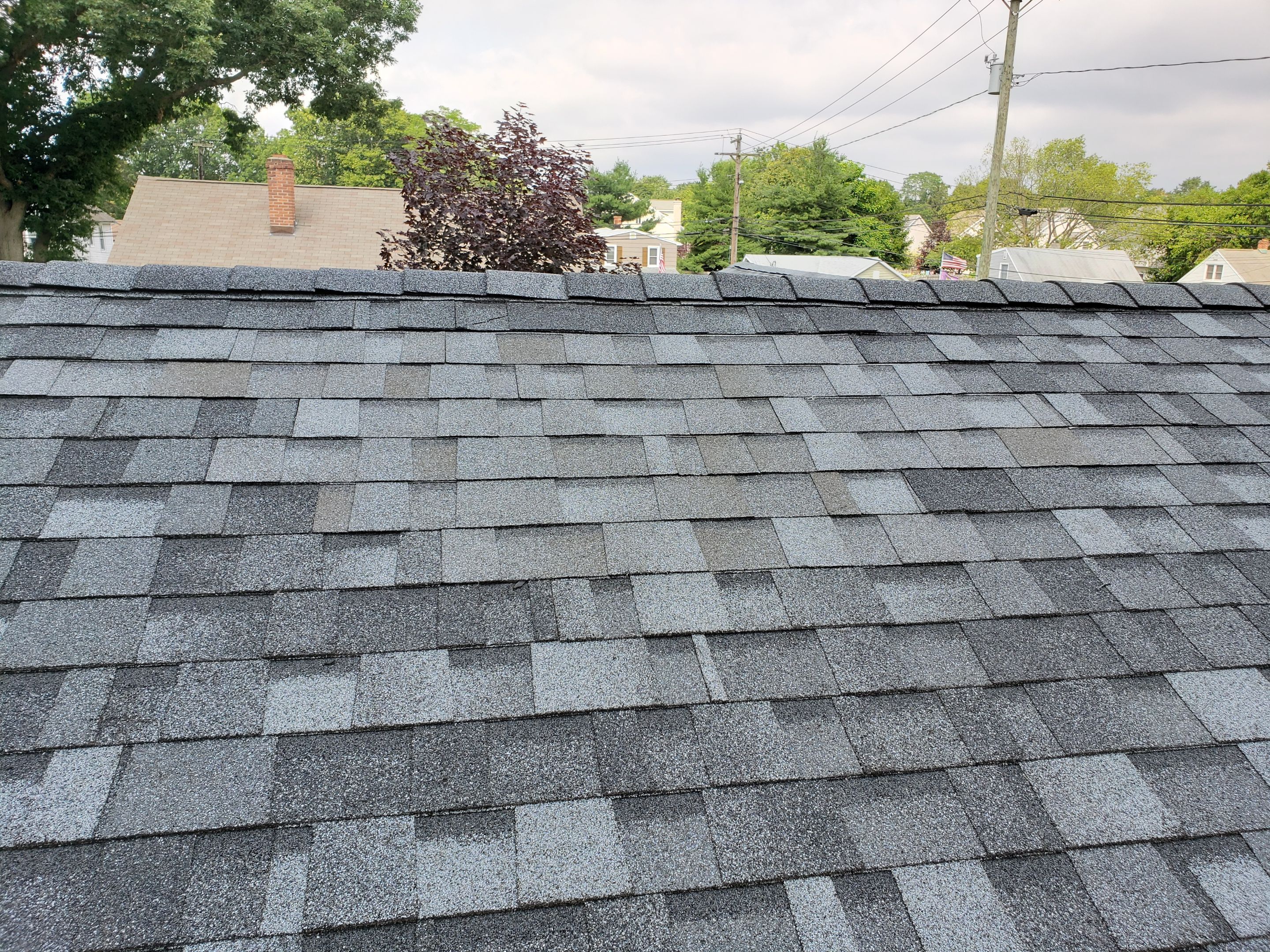Residential Roofing Installation using Owens Corning Duration Slatestone Gray by A Plus Exterior