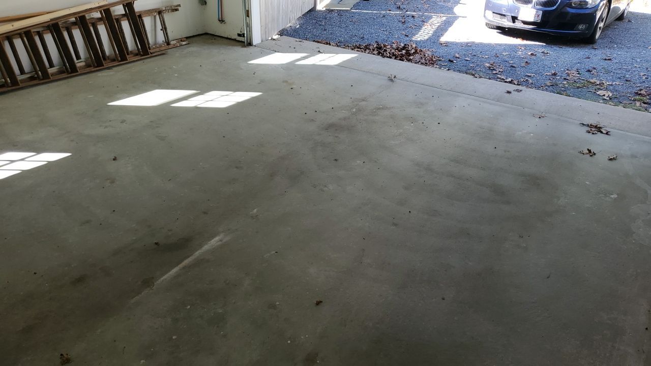 Garage in Mashpee, MA 02649 by Symphony Concrete Coatings