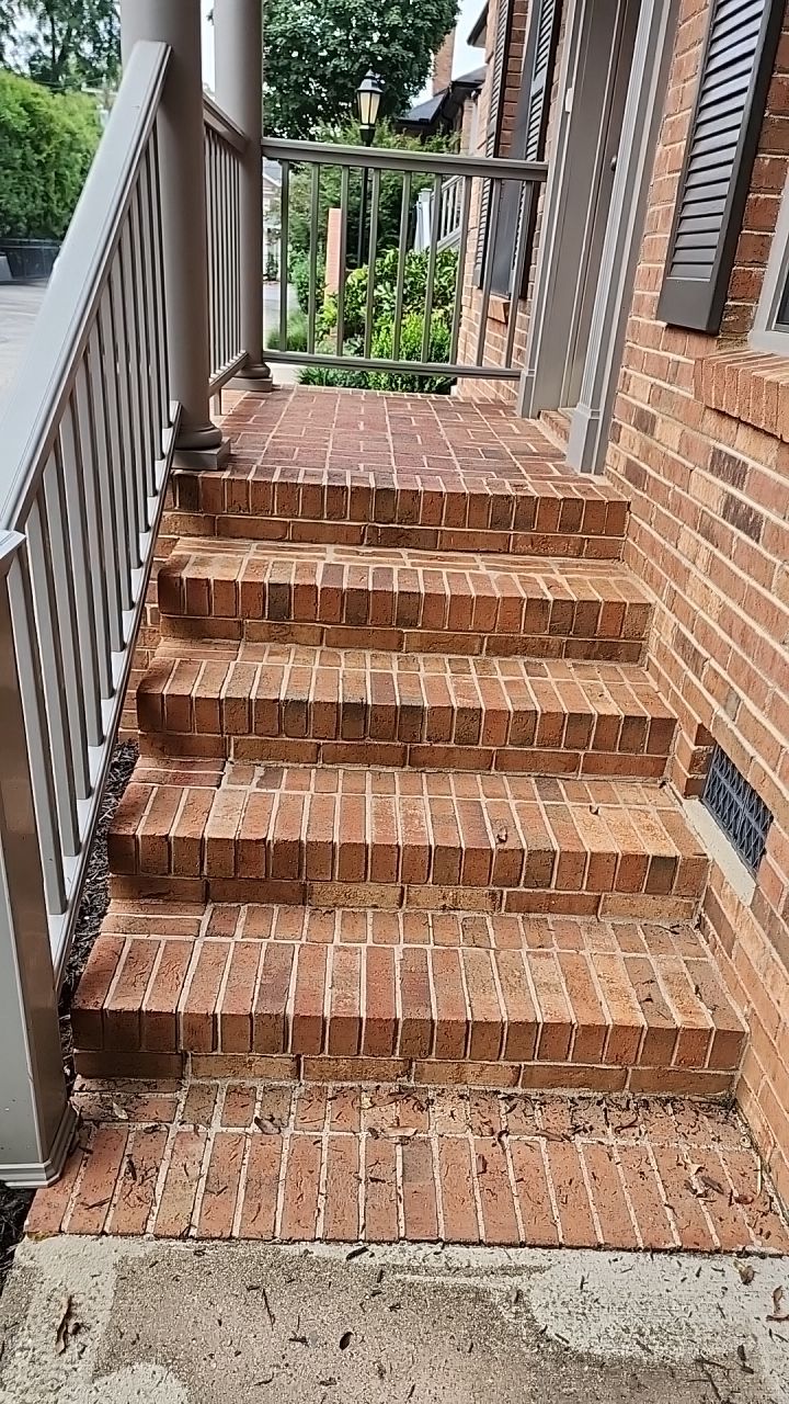 building clean using cleaner by Power Wash Masters LLC