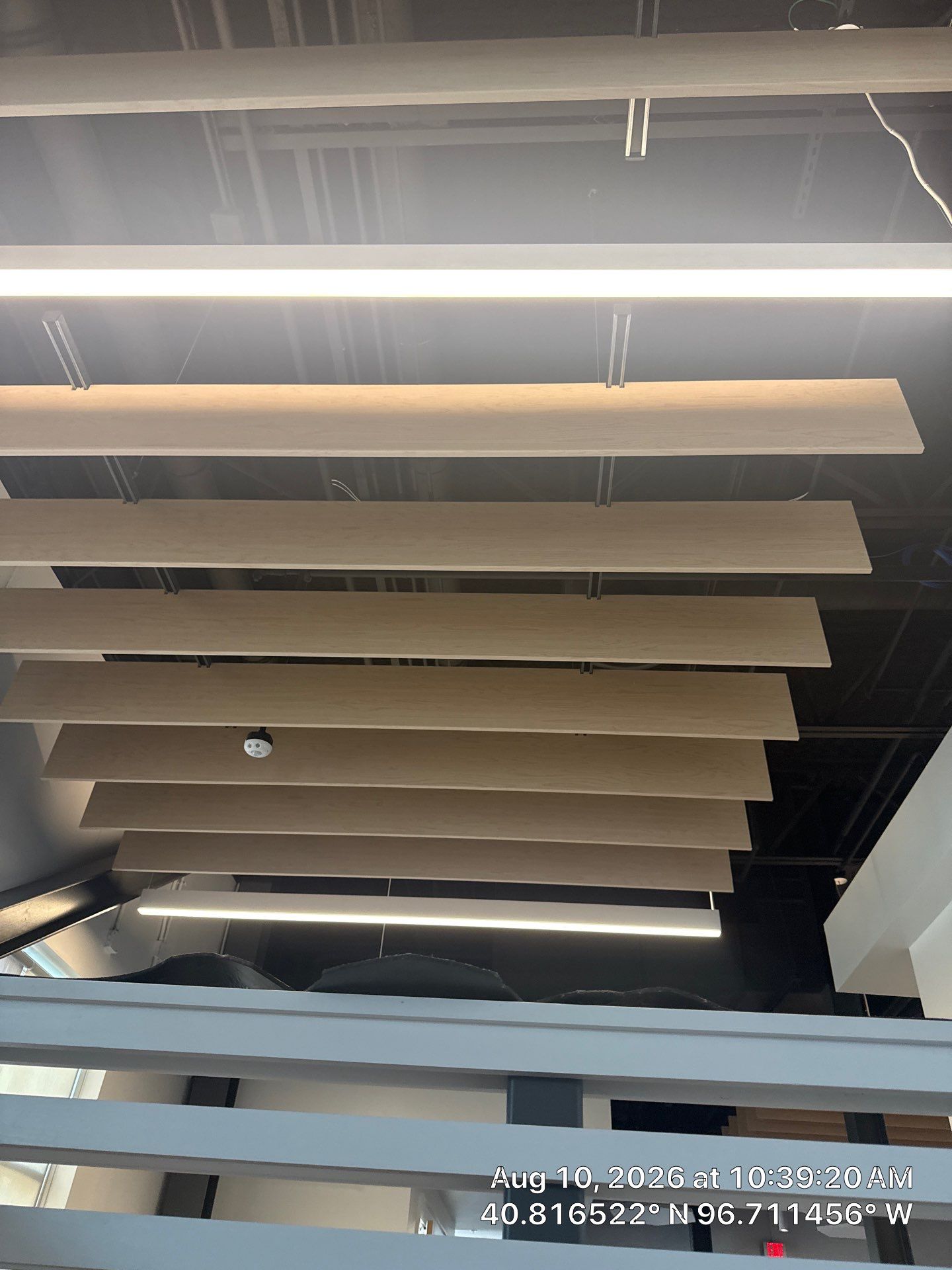 Commercial Office Remodel Featuring Acoustic Baffles and Integrated Lighting by CompanyCam Sales Demo
