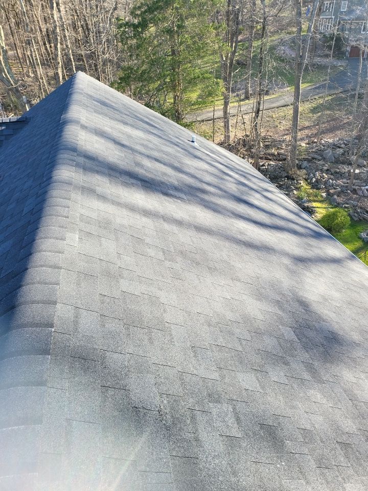 Residential Roofing Installation using onyx black by A Plus Exterior