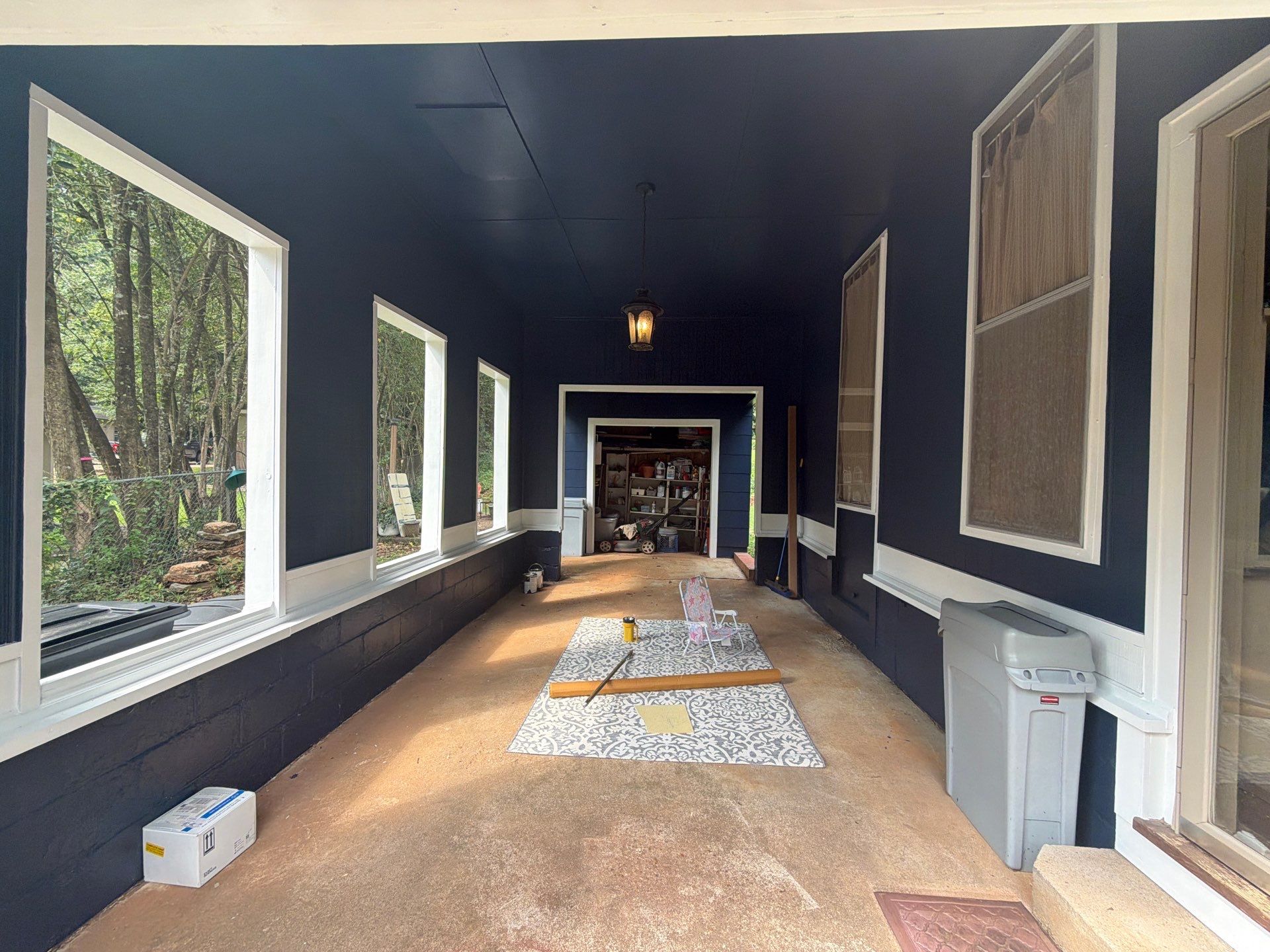 Full Exterior Repaint with Navy Blue and White Trim by Swift Home Renovations