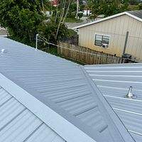 .032 Aluminum 1.5" Mechanical Seam Matte Black  by Total Roofing System The Metal Roof Experts