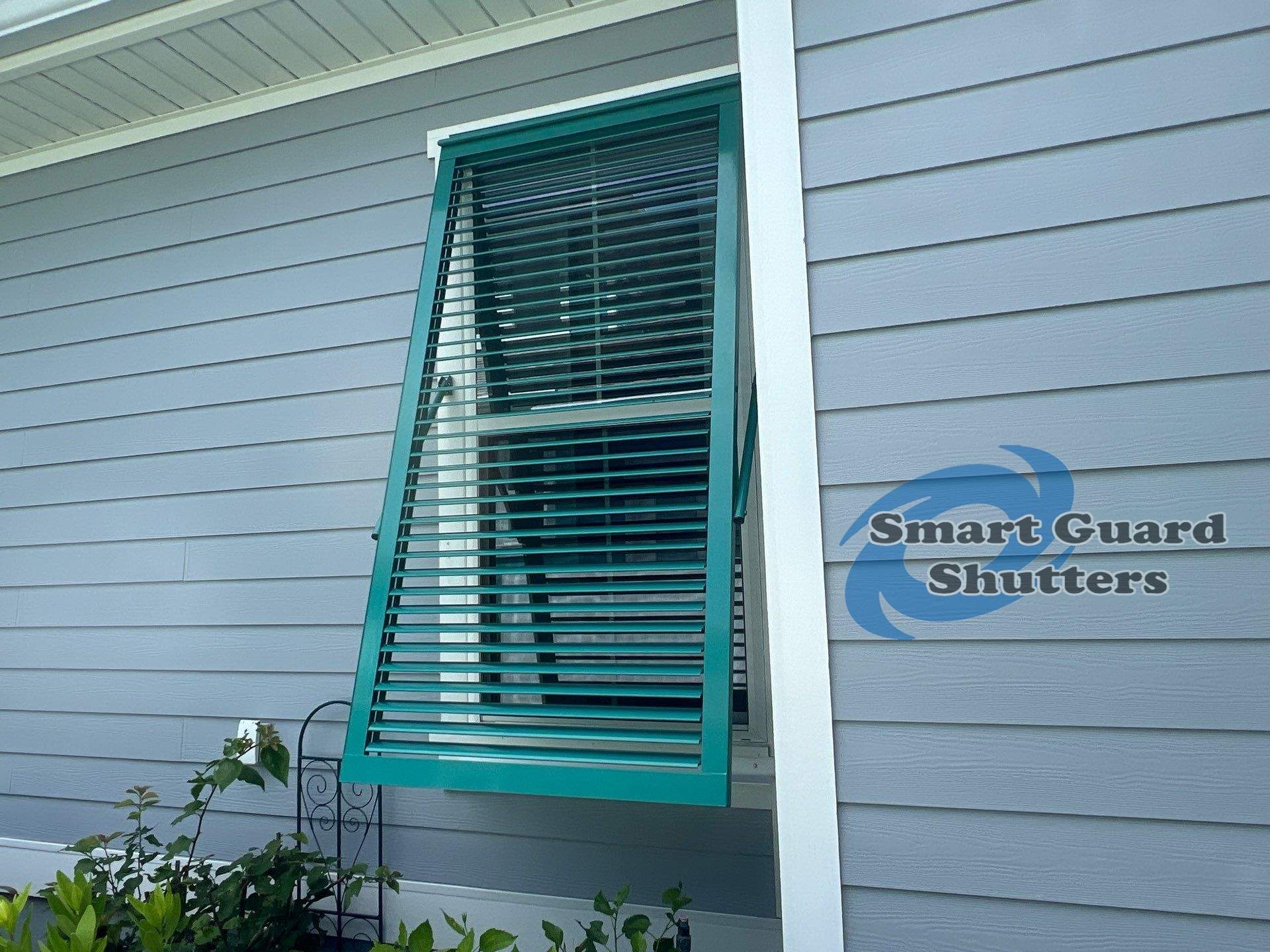Impact Bahamas in Mint Turquoise by Smart Guard Shutters