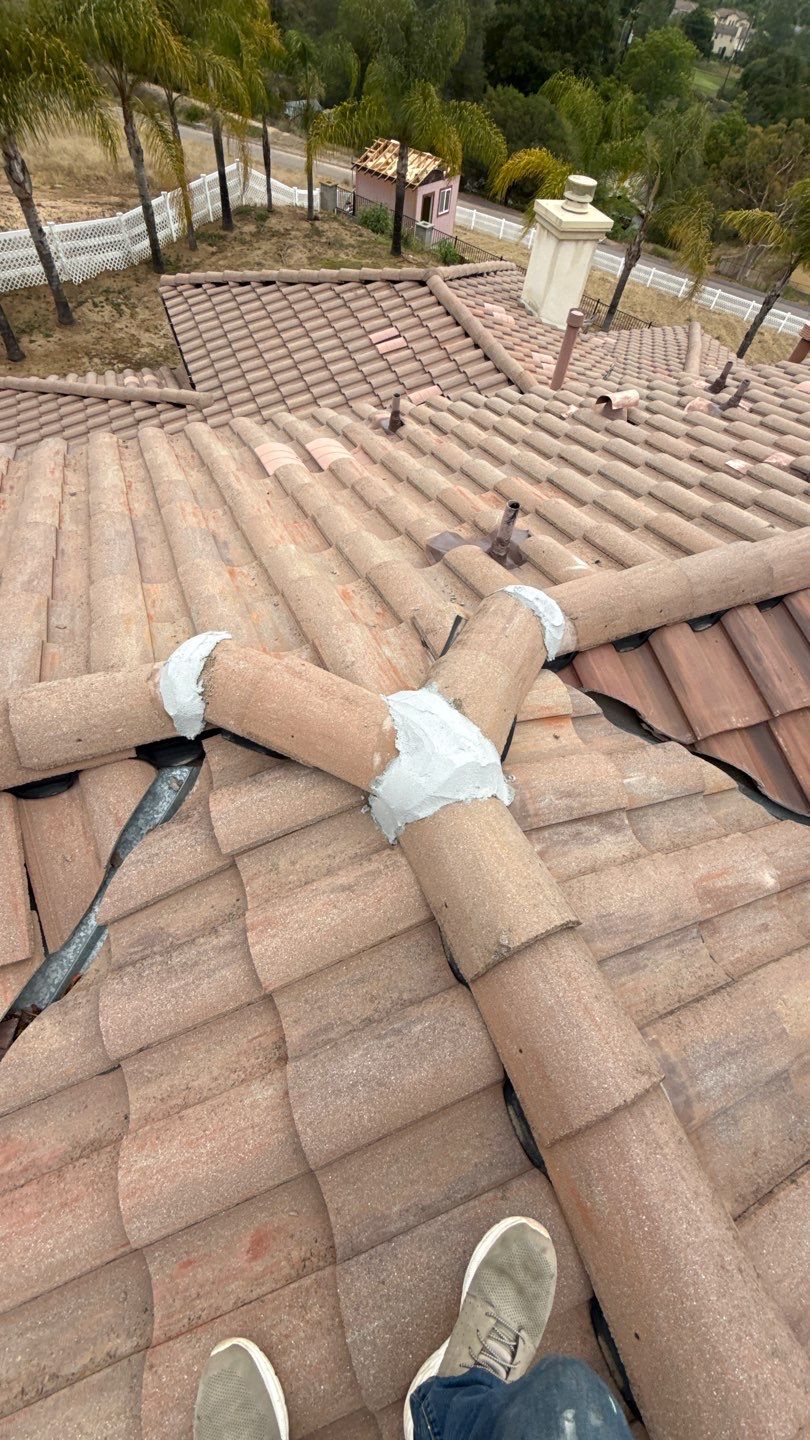 Terracotta Tile Roof Repair and Ridge Cap Sealing in Escondido by Reliable Roofing San Diego Inc.