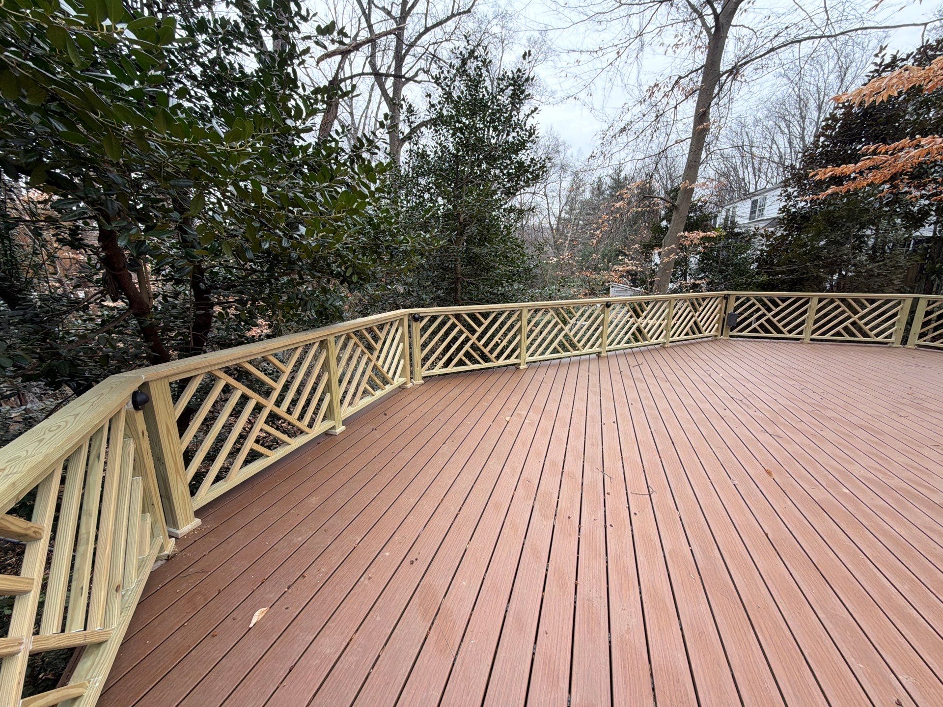 Custom Composite Deck Replacement with Geometric Railing in Bethesda, MD by Jakari Restoration & Construction LLC