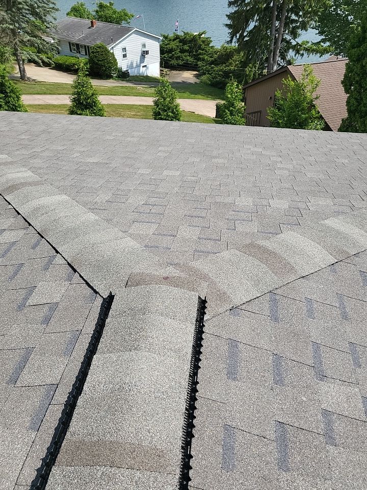 ATLAS PINNACLE HP W/SCOTCHGARD COLOR: WEATHERED WOOD by Eagle Eye Roofing