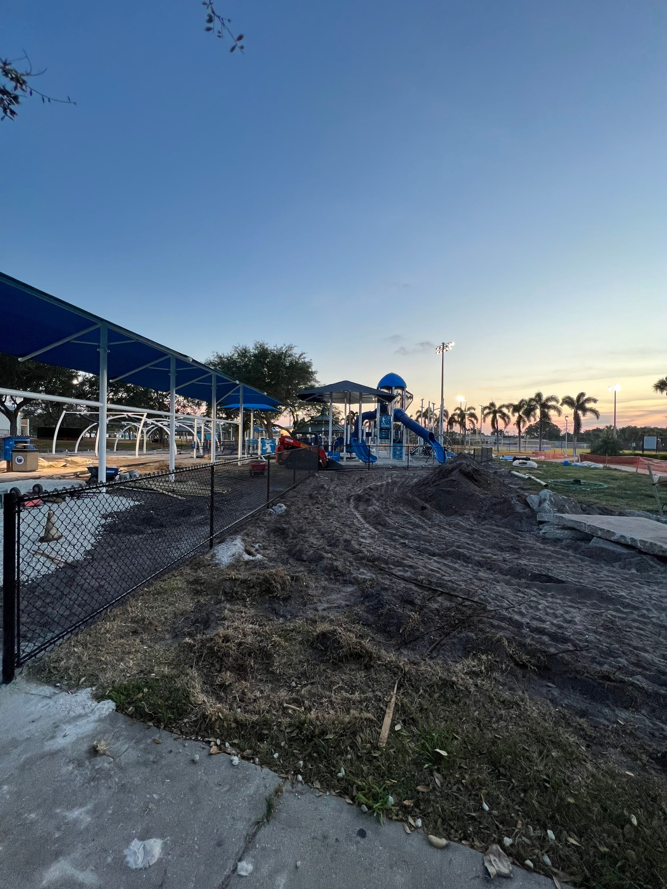 Vinyl Coated Chain-link fence for the City of Naples around Fleischmann Park Playground.  by Asap fence and gates, LLC