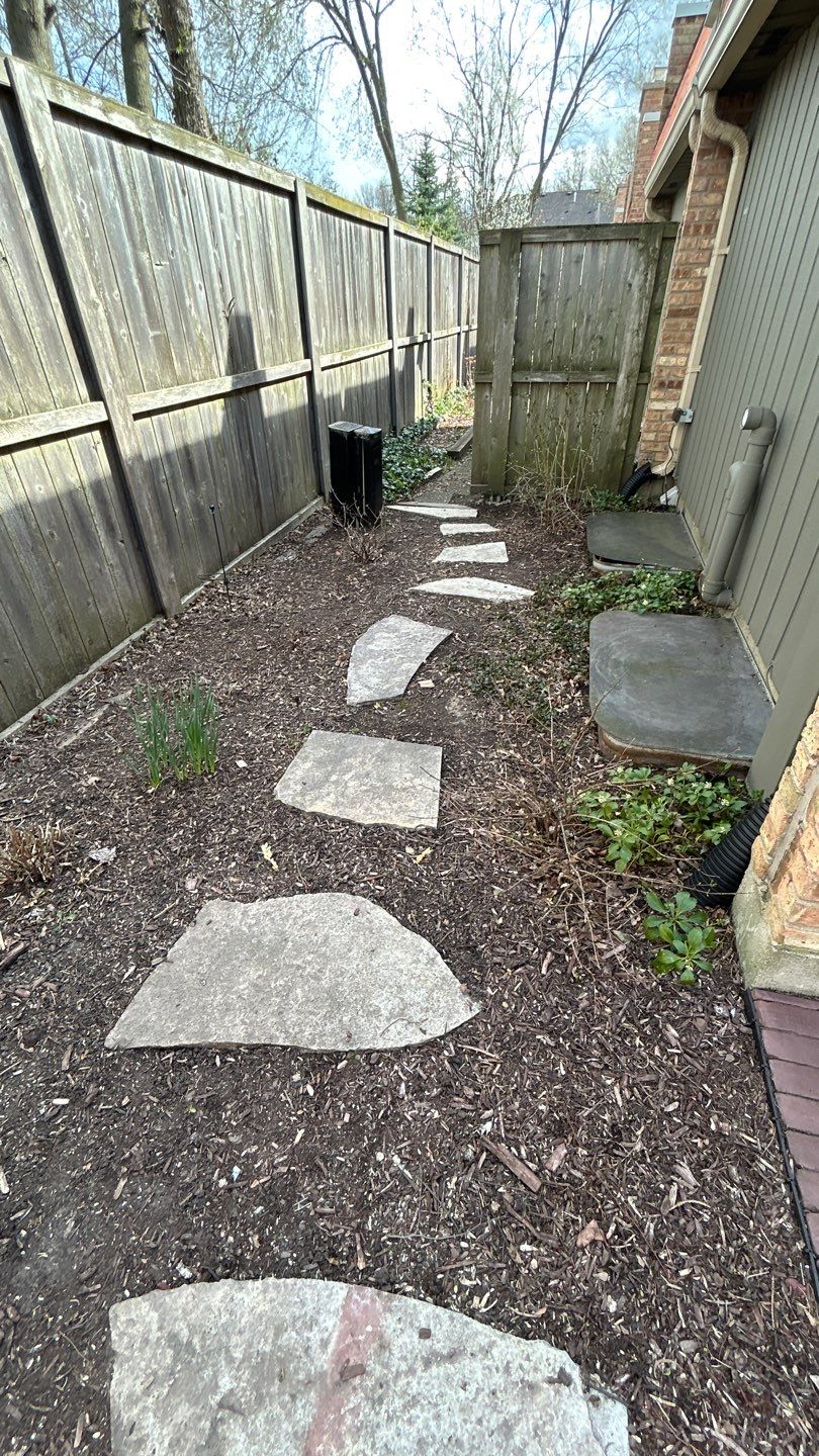 Flagstone stepper cleaning by Northern Power Washing LLC.