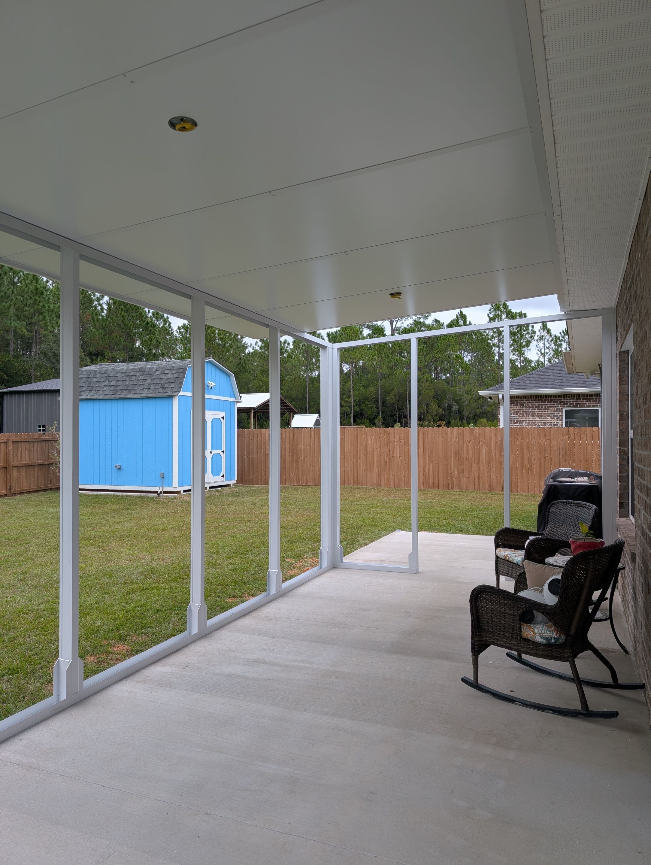 Home addition w/Vinyl 4-Track Windows by Titan Sunrooms