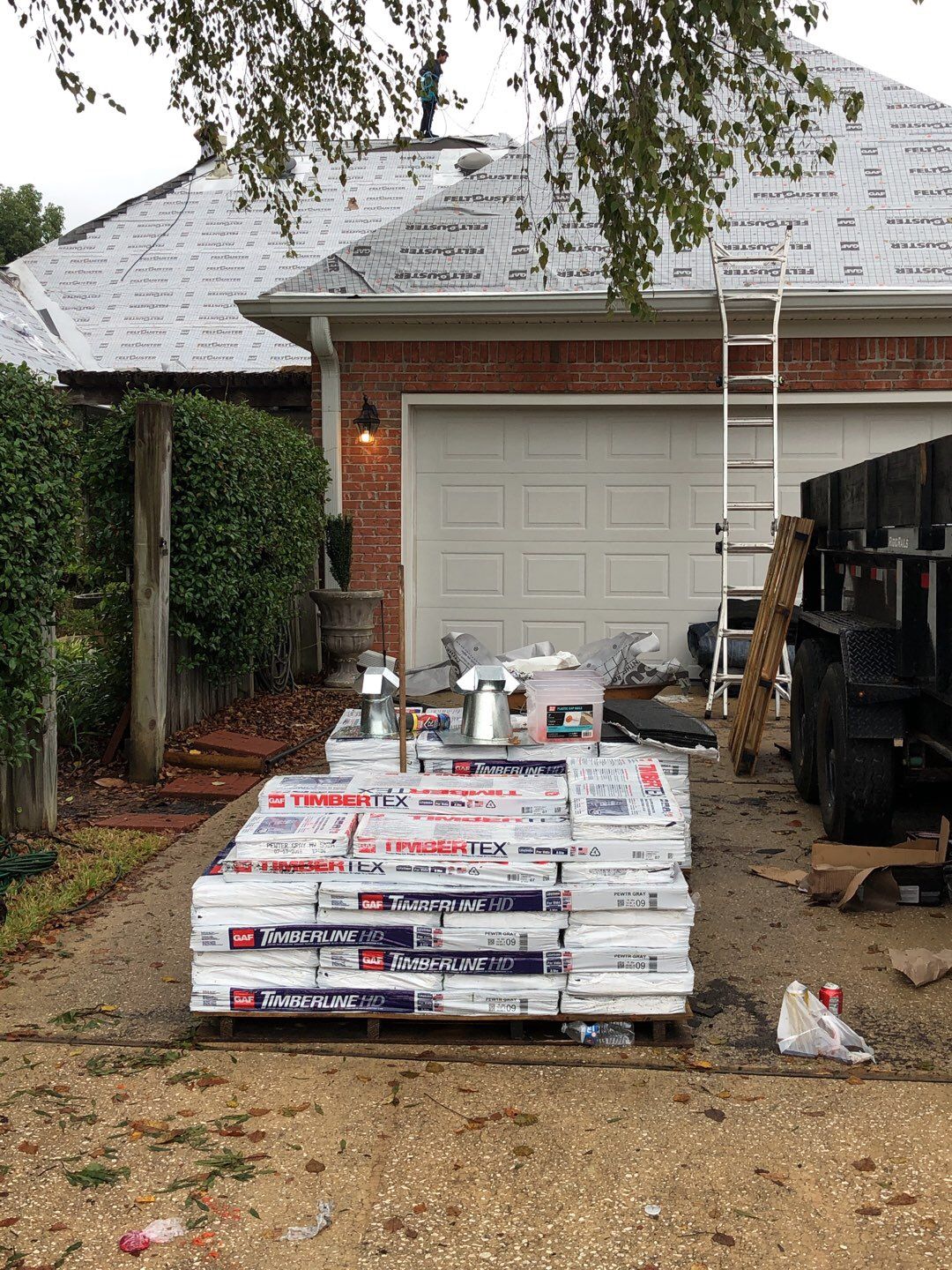 Residential Roofing Installation using Roof Replacement by American Roofing & Construction LLC