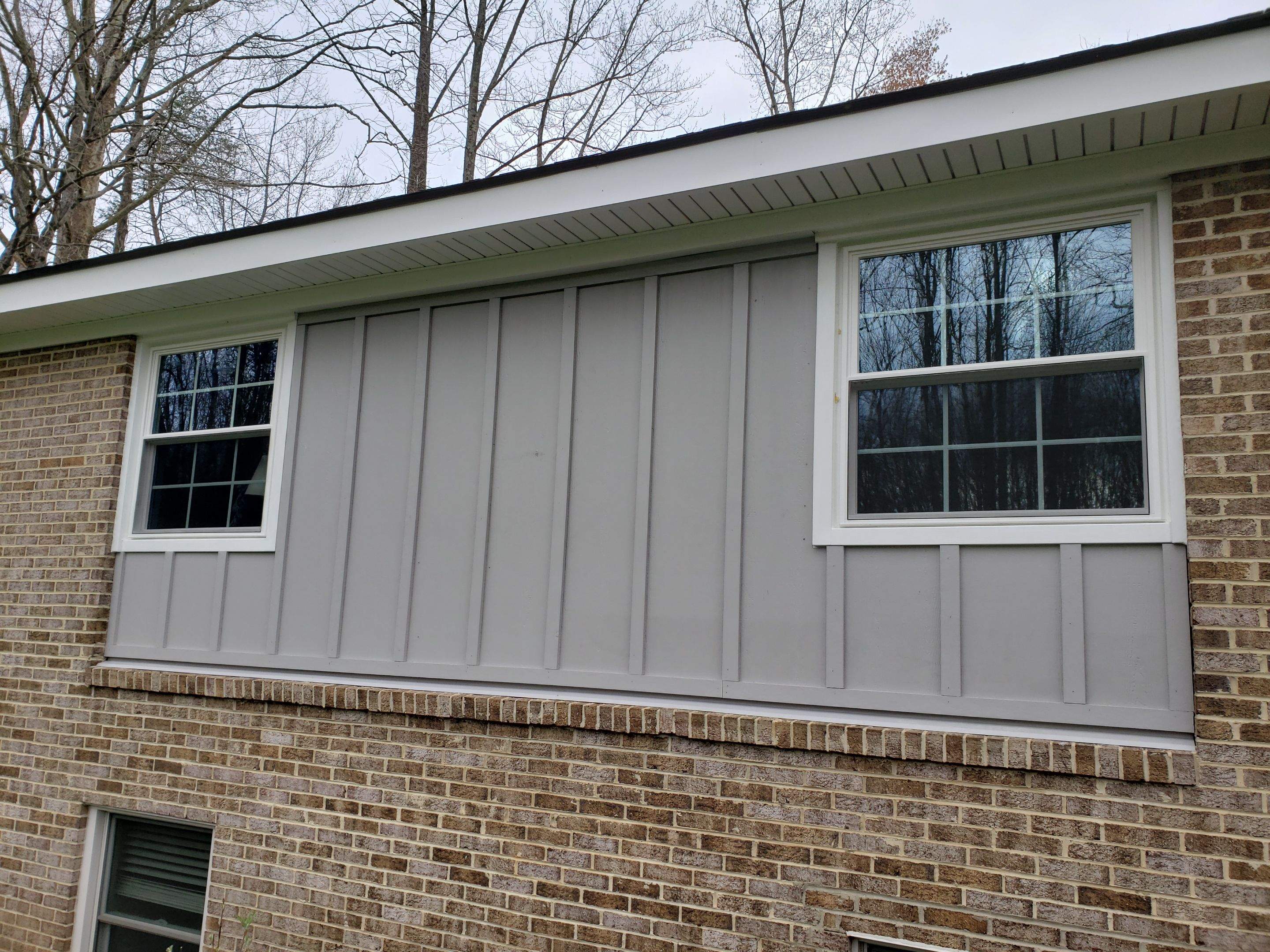 Roof, Siding, Door, and gutter replacement by American Home Contractors
