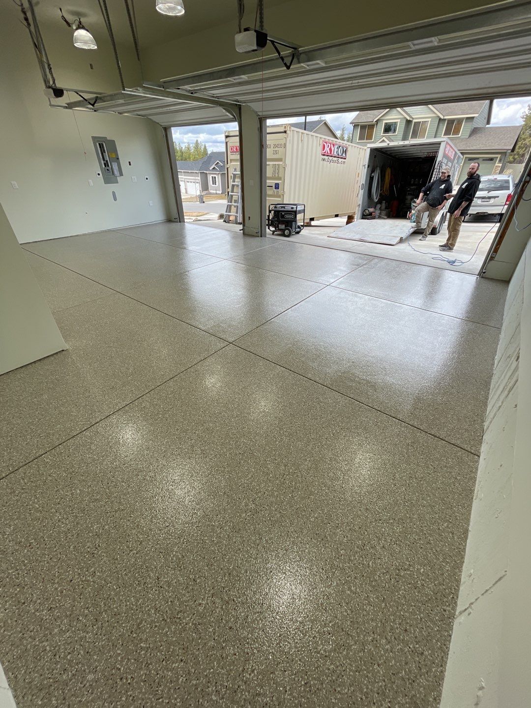 Garage Transformation using Pebble Beach by Croc Coatings, LLC