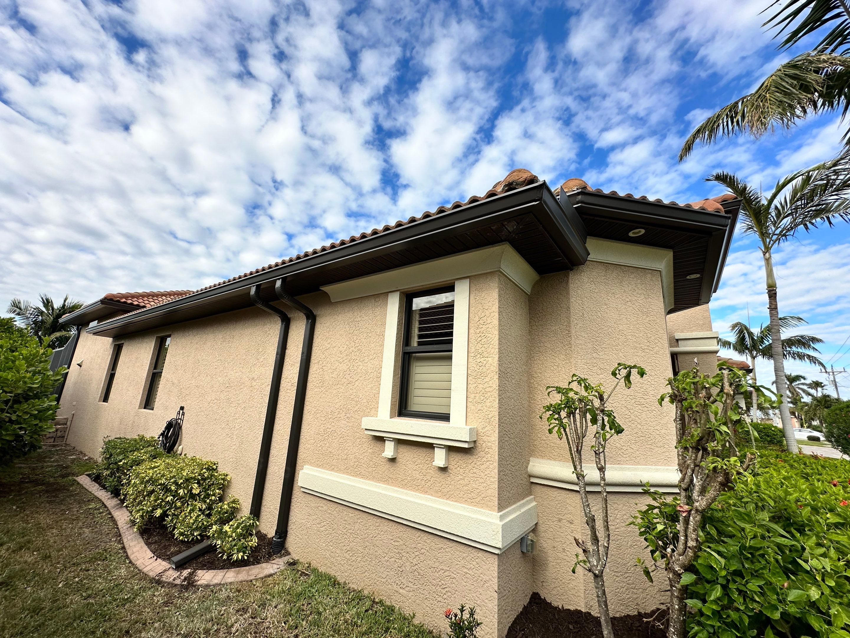 Bronze Downspout Installation in Cape Coral FL by Gutter Professors