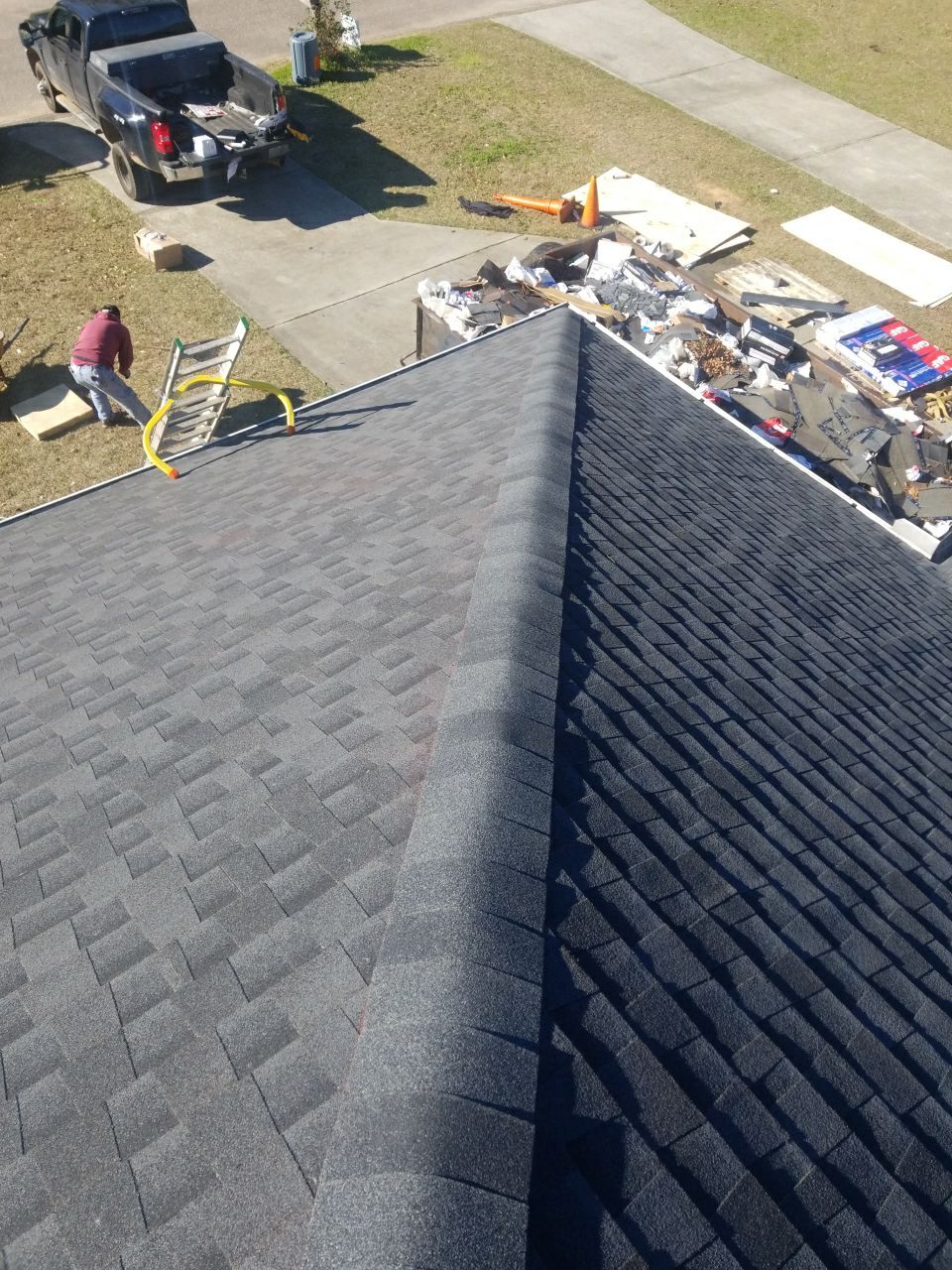 Residential Roofing Installation using Roof Replacement by American Roofing & Construction LLC