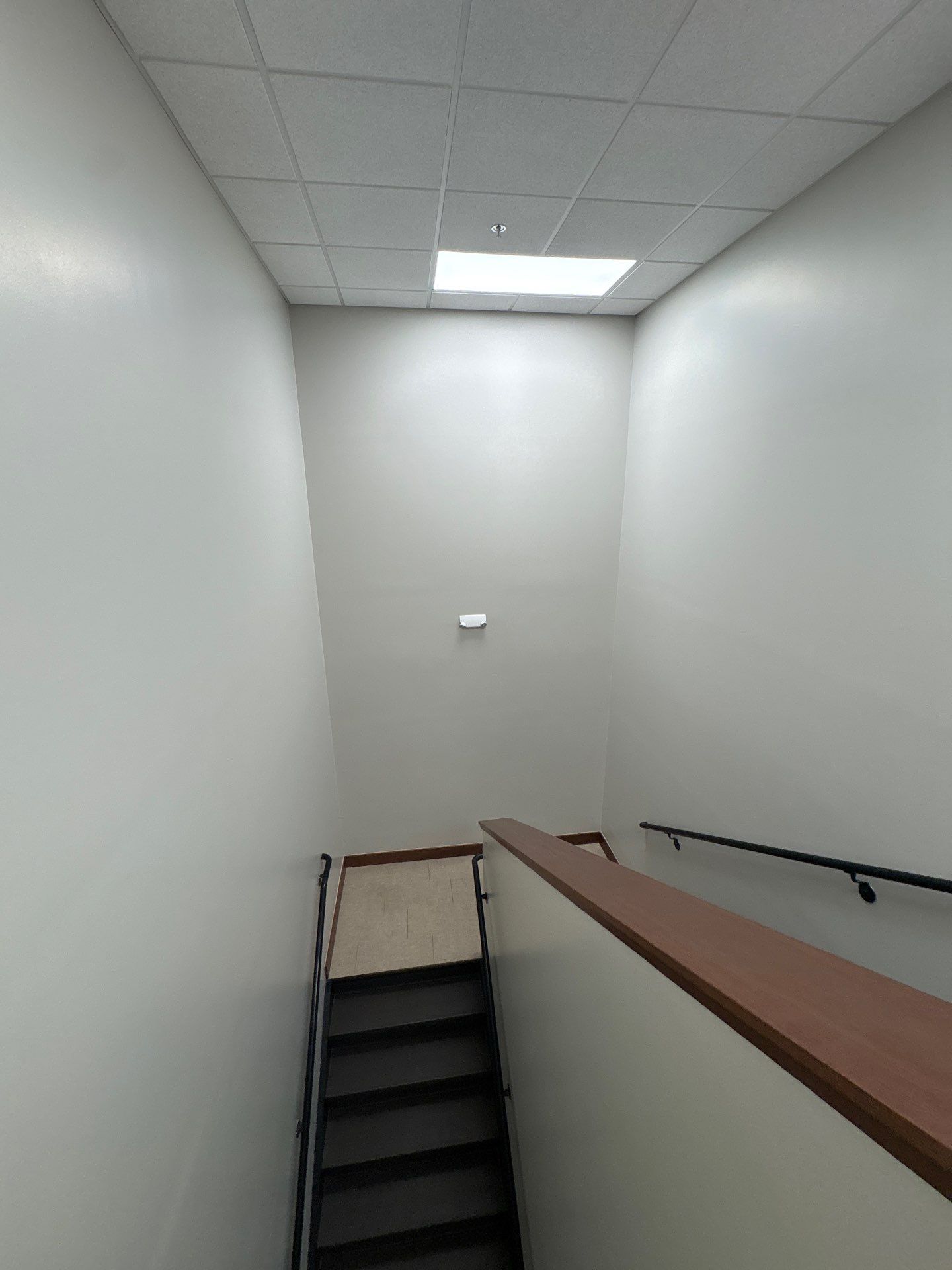 Commercial Office Interior Remodel and Modern Suite Refresh in Sioux Falls by Select Painting, Coatings & Garage Cabinets