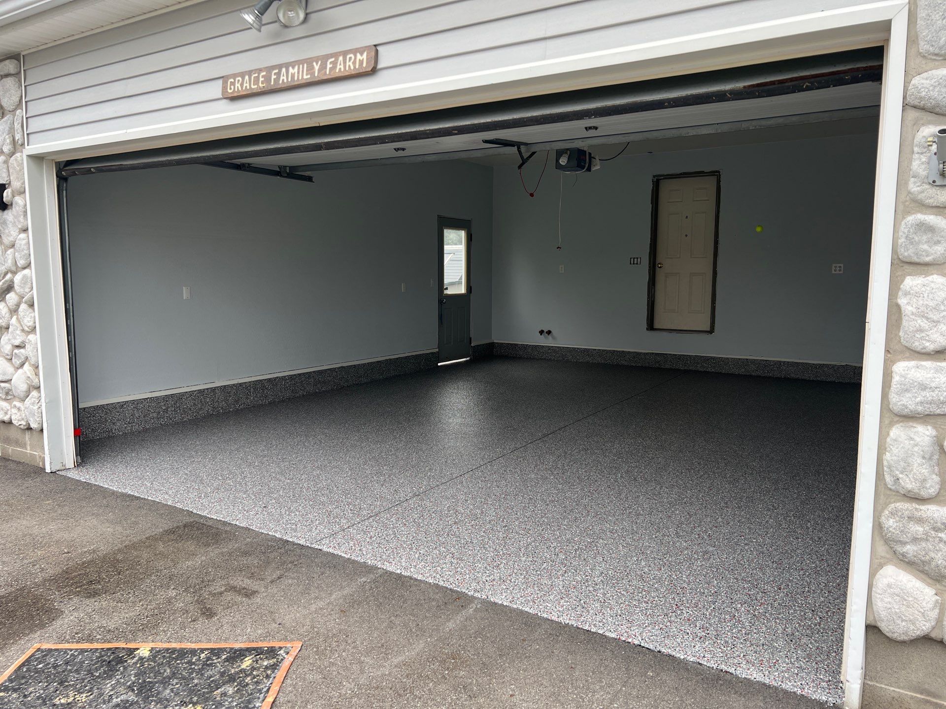 Crimson Storm Garage Coating  by NG Masonry & Construction LLC