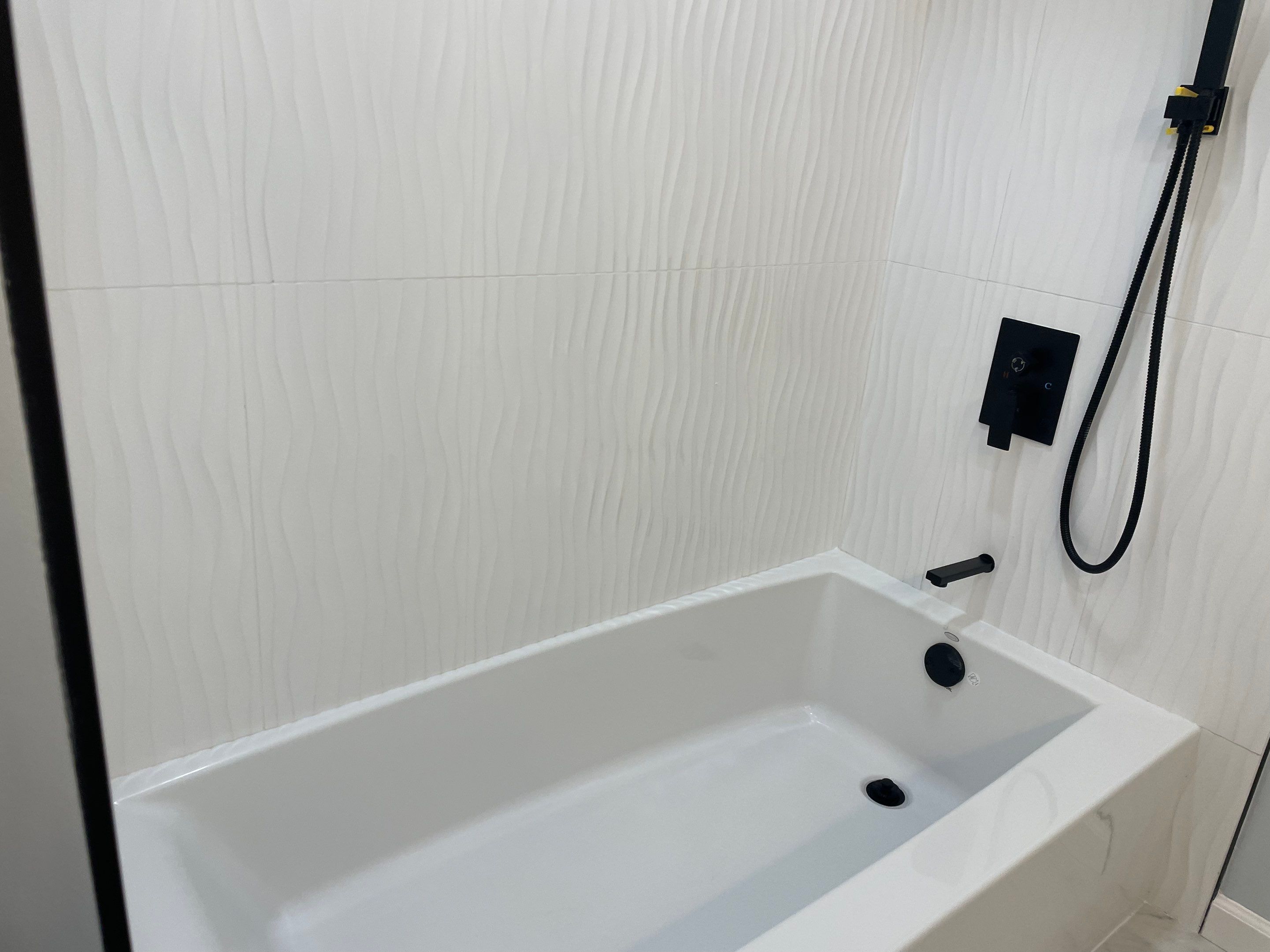 Bathroom Remodel using Tile by Home Concepts Construction