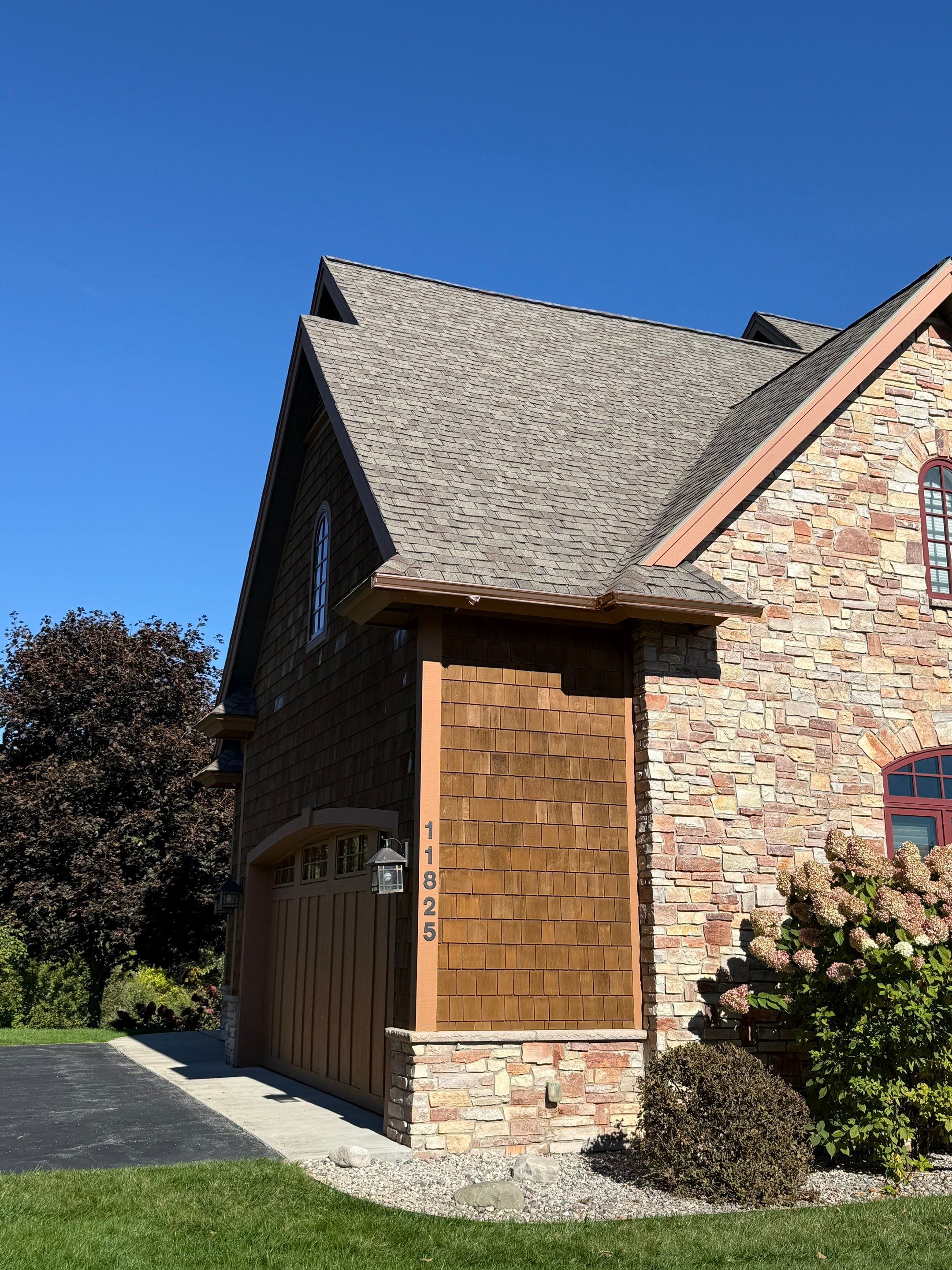Custom Copper Gutter and Metal Downspout Installation in Williamsburg by Rainbow Seamless Systems