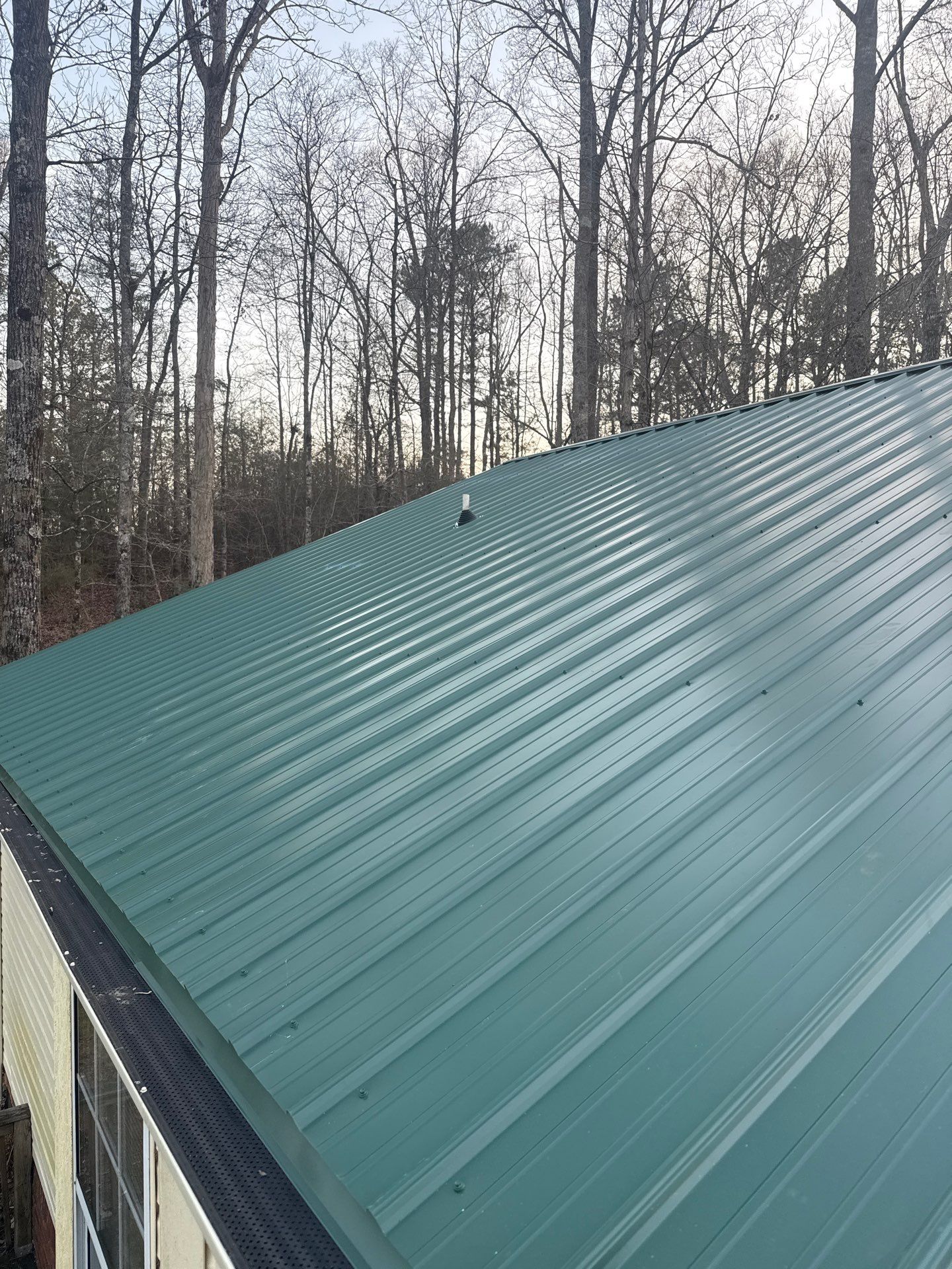 Metal Roof and Gutters Replacement in Hueytown by The Roofing Dudes