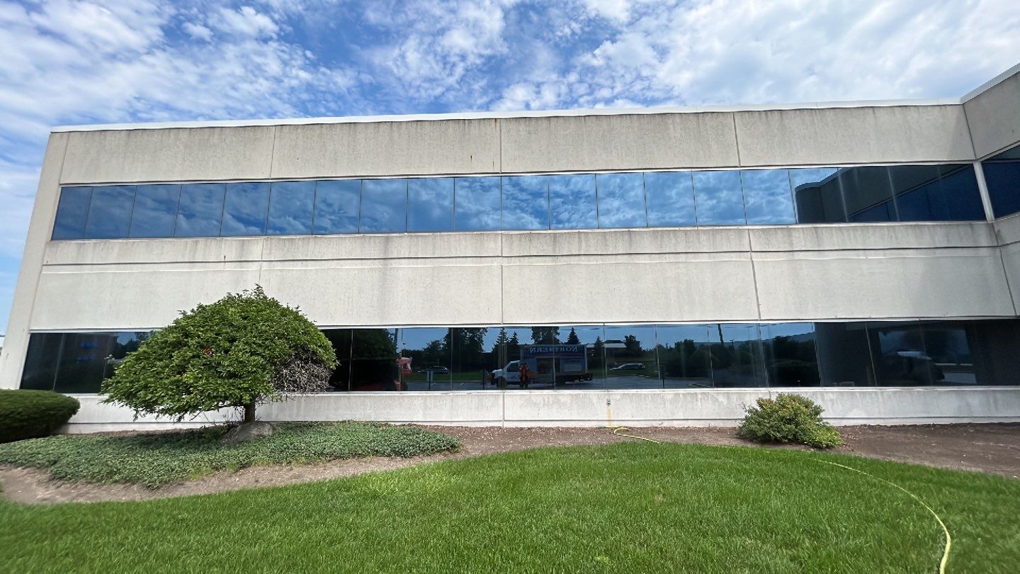 commercial pressure washing using Algaecide, soft wash soap by Northern Power Washing LLC.