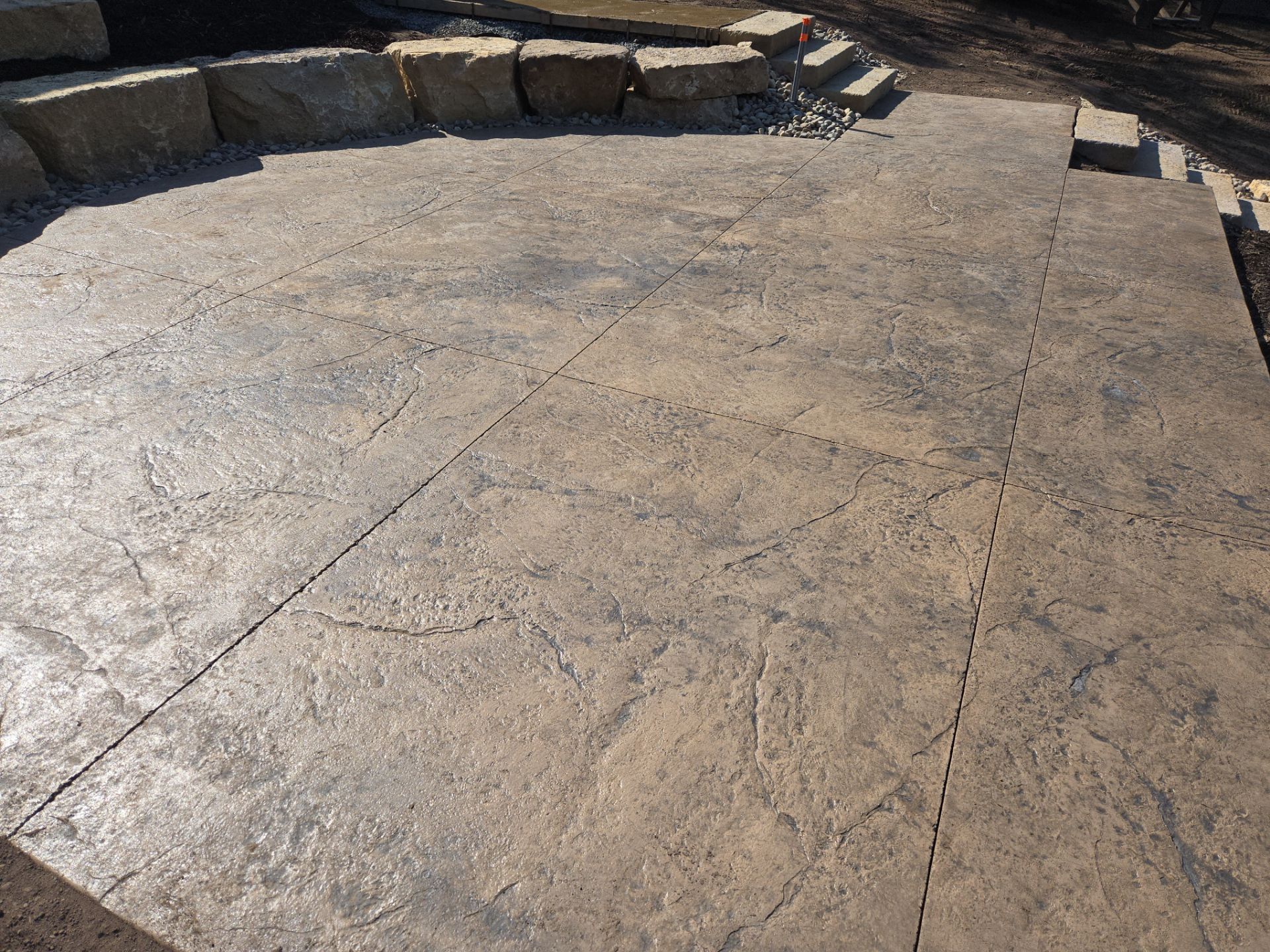 Limestone Outcroppings/ Steps / Stamped Concrete by Balsam Lake Pro Lawn