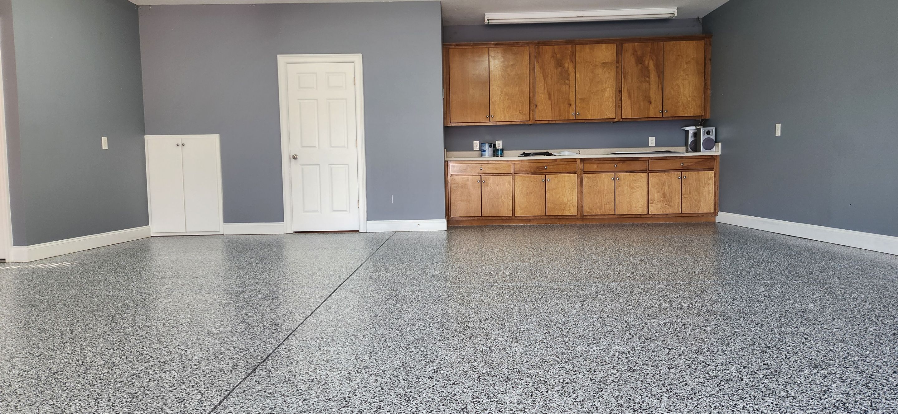 2 Garages Completed using Domino by Elite Floor Solutions