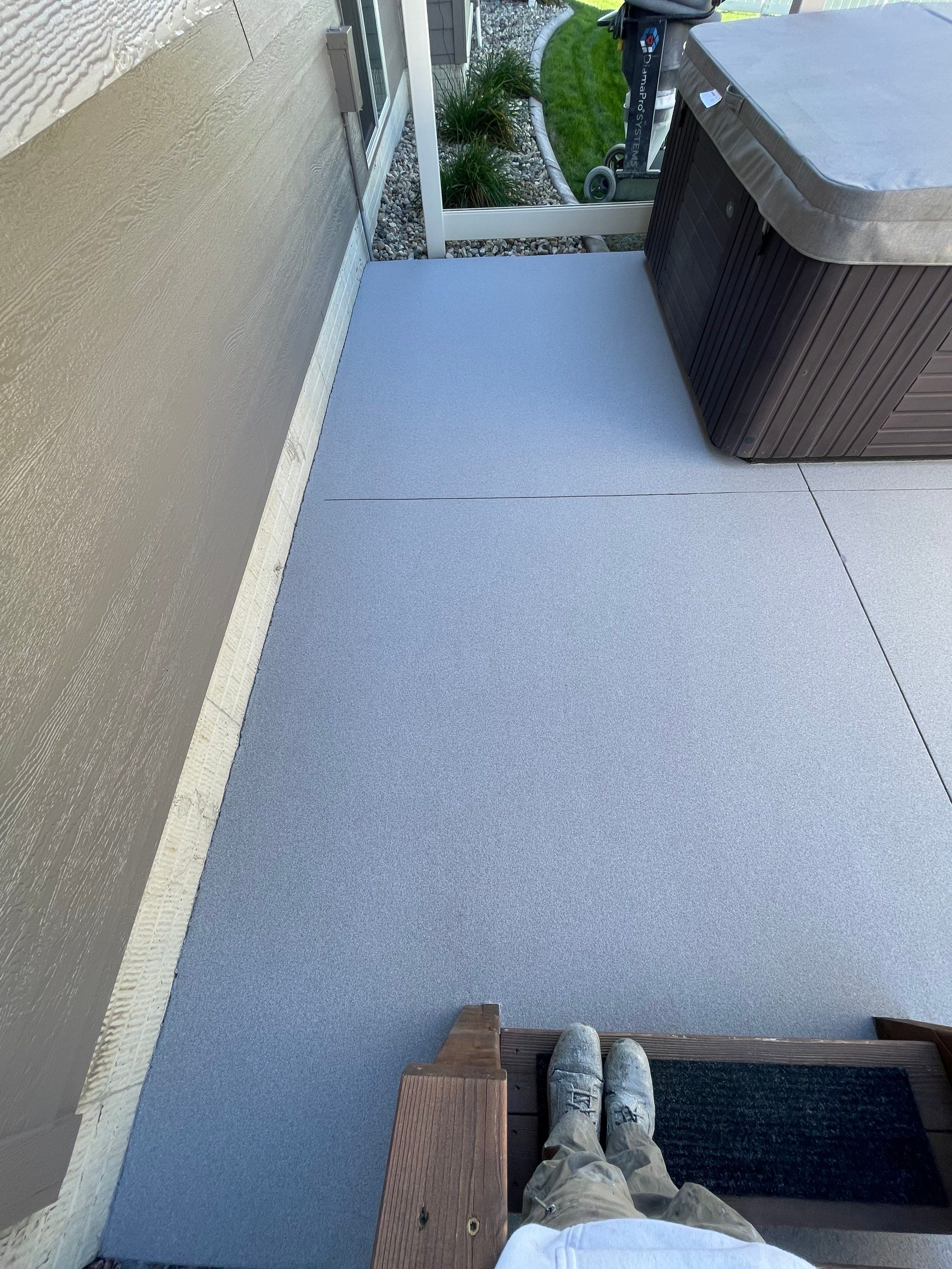 Garage and Patio Concrete Coatings in Sioux Falls by Select Painting, Coatings & Garage Cabinets