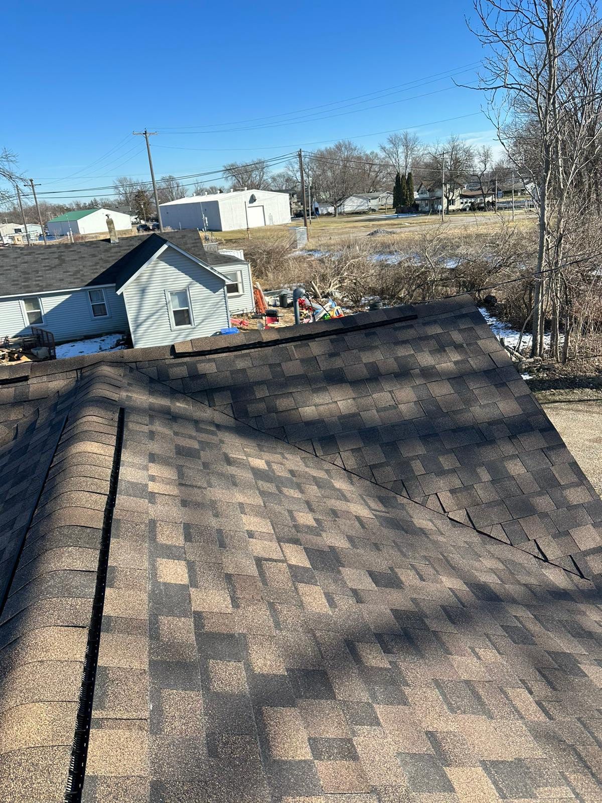 Sharkey Roof by Erie Home
