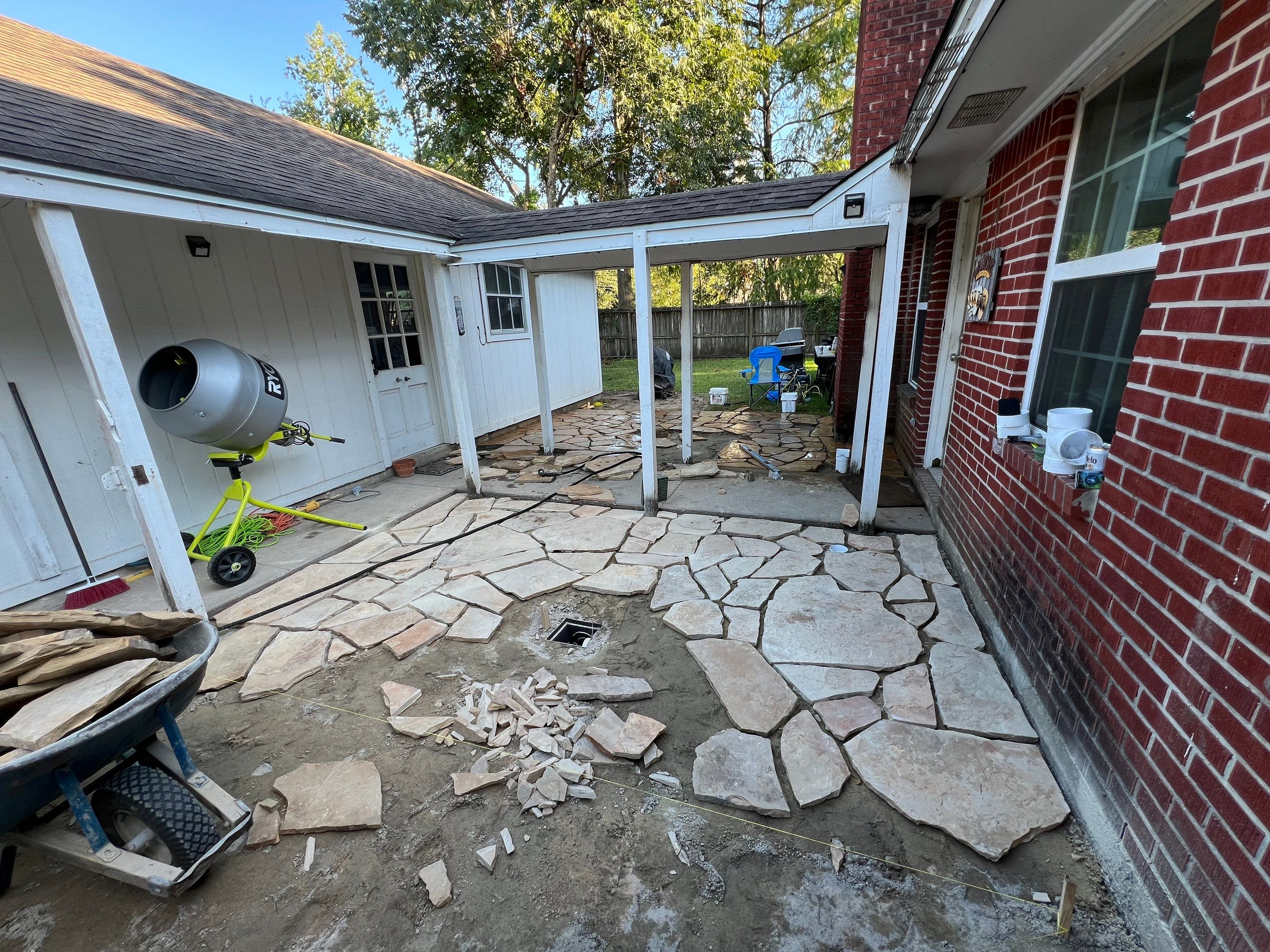 🌿 Rodney – Full Gutters, Drainage System, Flagstone Patio & Pergola  Alejandro and the Texas Urban Elements Team recently completed a multi-solution project for Rodney’s home, blending function with design.  ✅ Seamless Gutters We installed a complete 6” seamless gutter system around the home to properly redirect rainwater away from the foundation, protecting siding, paint, and landscaping while boosting curb appeal.  ✅ Drainage System A new PVC storm drainage system was integrated into the gutters and extended to carry roof runoff away from the house. This ensures water won’t pool near the foundation or the new patio area.  ✅ Flagstone Patio Ground We prepped, leveled, and installed a custom flagstone patio for Rodney—delivering both beauty and durability, creating a natural, timeless look that ties perfectly into the yard.  ✅ Pergola Addition To conclude, our framing team constructed a small pergola extension, providing Rodney’s patio with a shaded retreat for family and friends to enjoy.  ✨ Result: A fully protected and enhanced outdoor living space where drainage, stonework, and structure all work together for long-lasting performance and comfort.  📢 At Texas Urban Elements, we specialize in building solutions that protect homes while creating beautiful outdoor environments. by Texas Urban Elements
