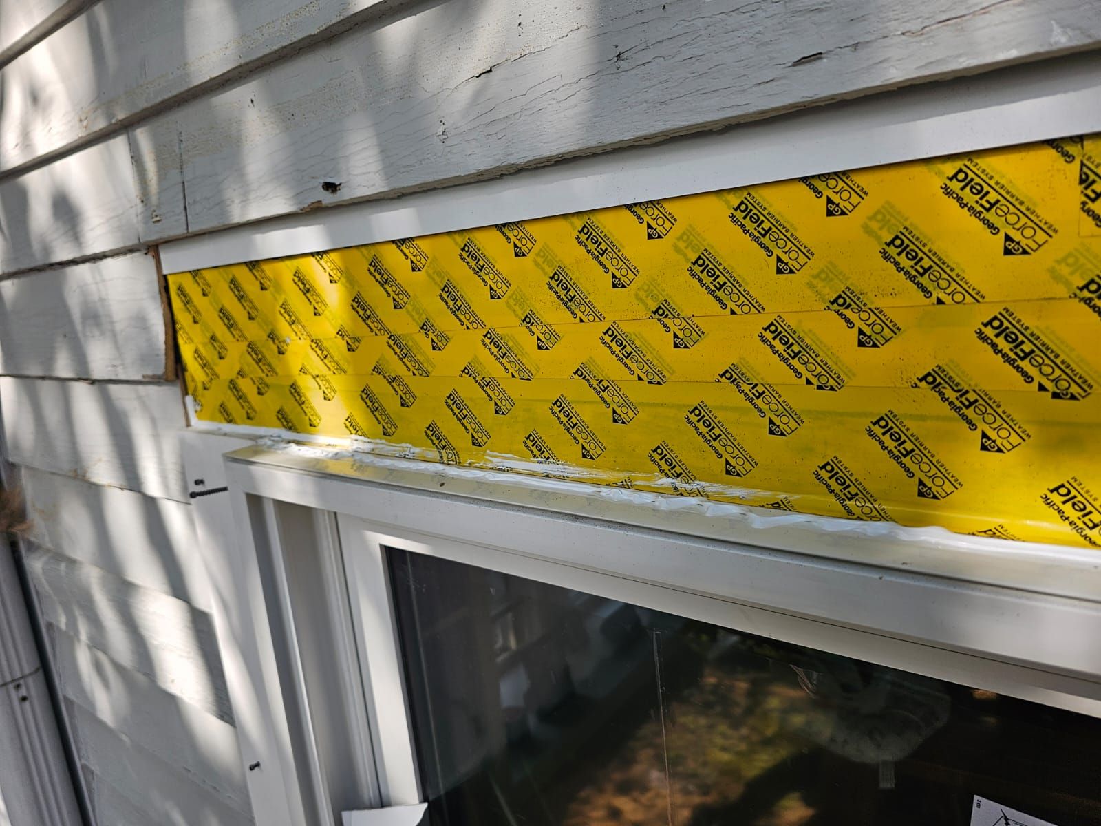 Patio Slider Door and Rear Deck  by Avalon Roofing and Exteriors