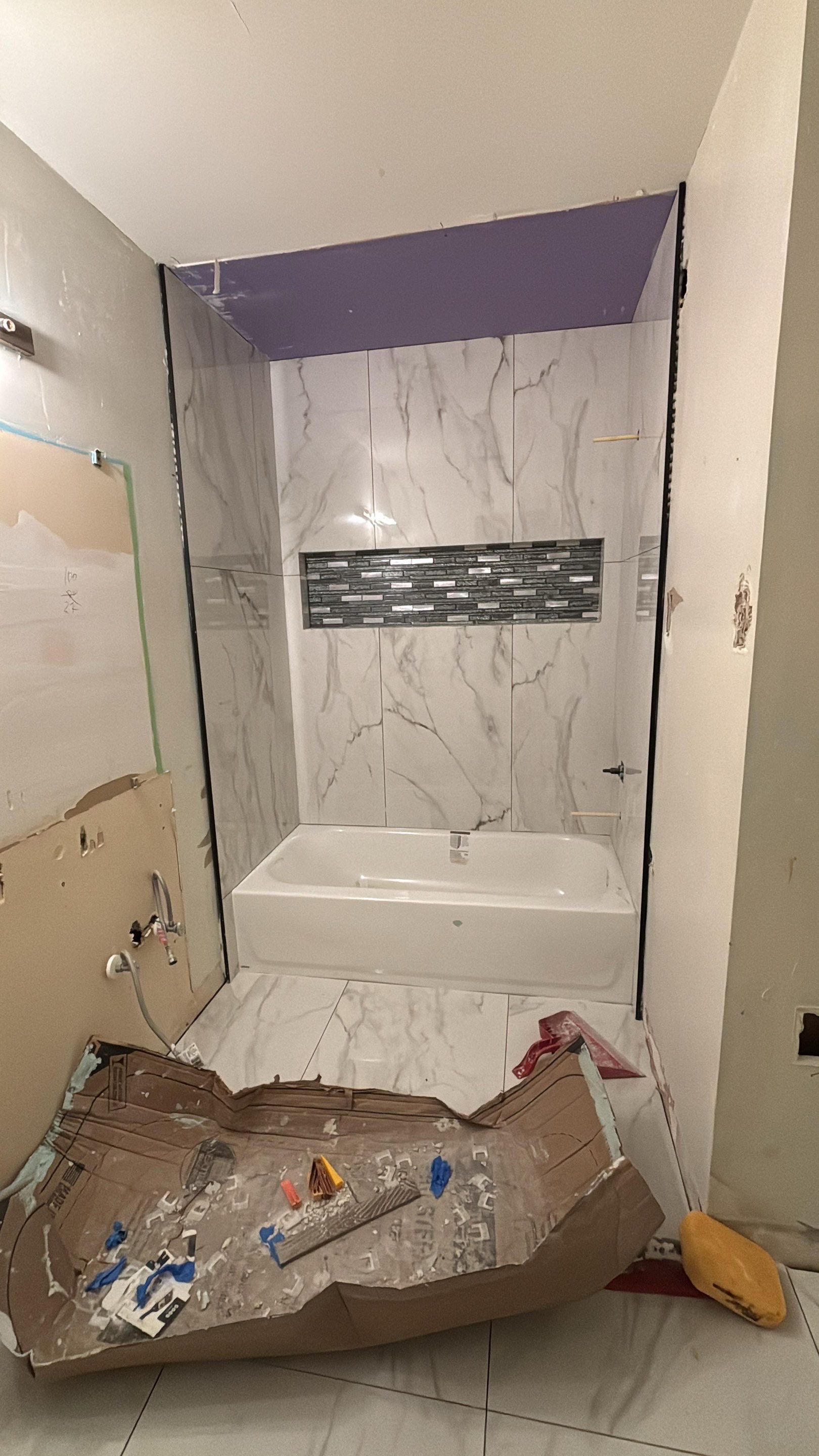 Master Bathroom, Children's Bathroom, and Fireplace Renovation by urban green energy llc