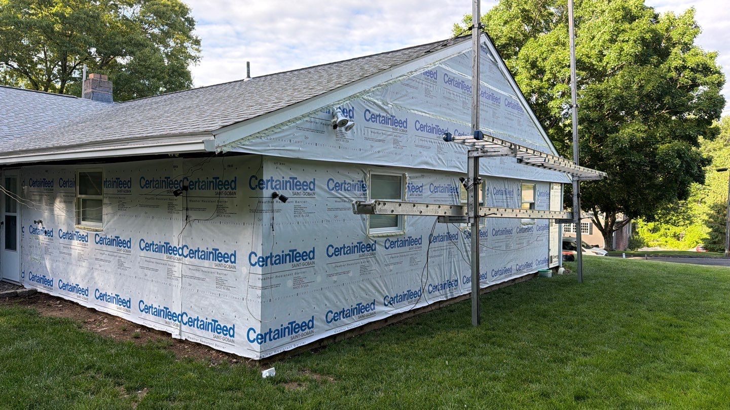 Siding Renovation with Cert Monogram D/4 x 12'6" Clapboard, Smoky Gray by DiGiorgi Roofing and Siding Inc