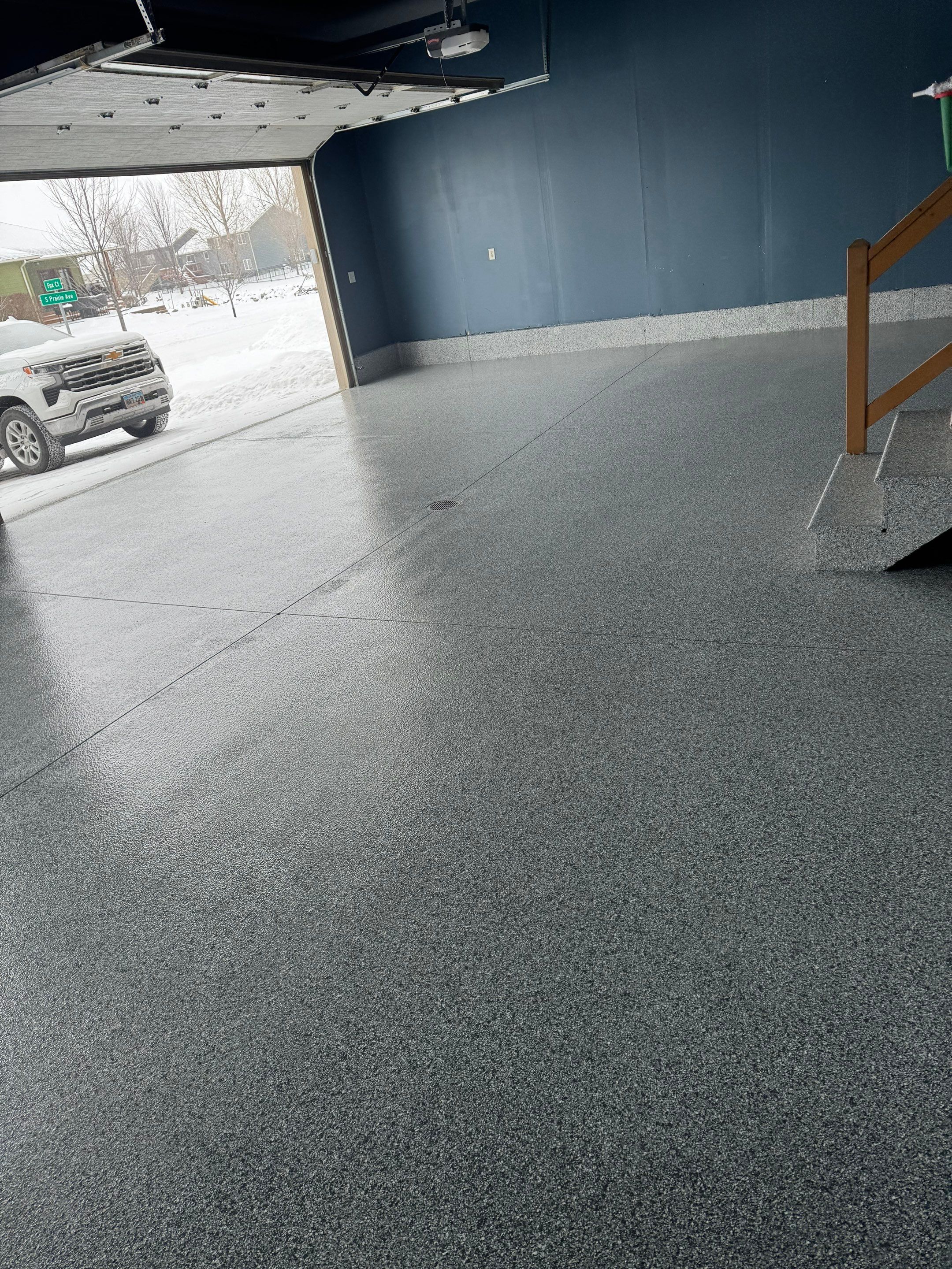 Grey Speckled Epoxy Garage Floor and Stair Coating in Sioux Falls by Select Painting, Coatings & Garage Cabinets