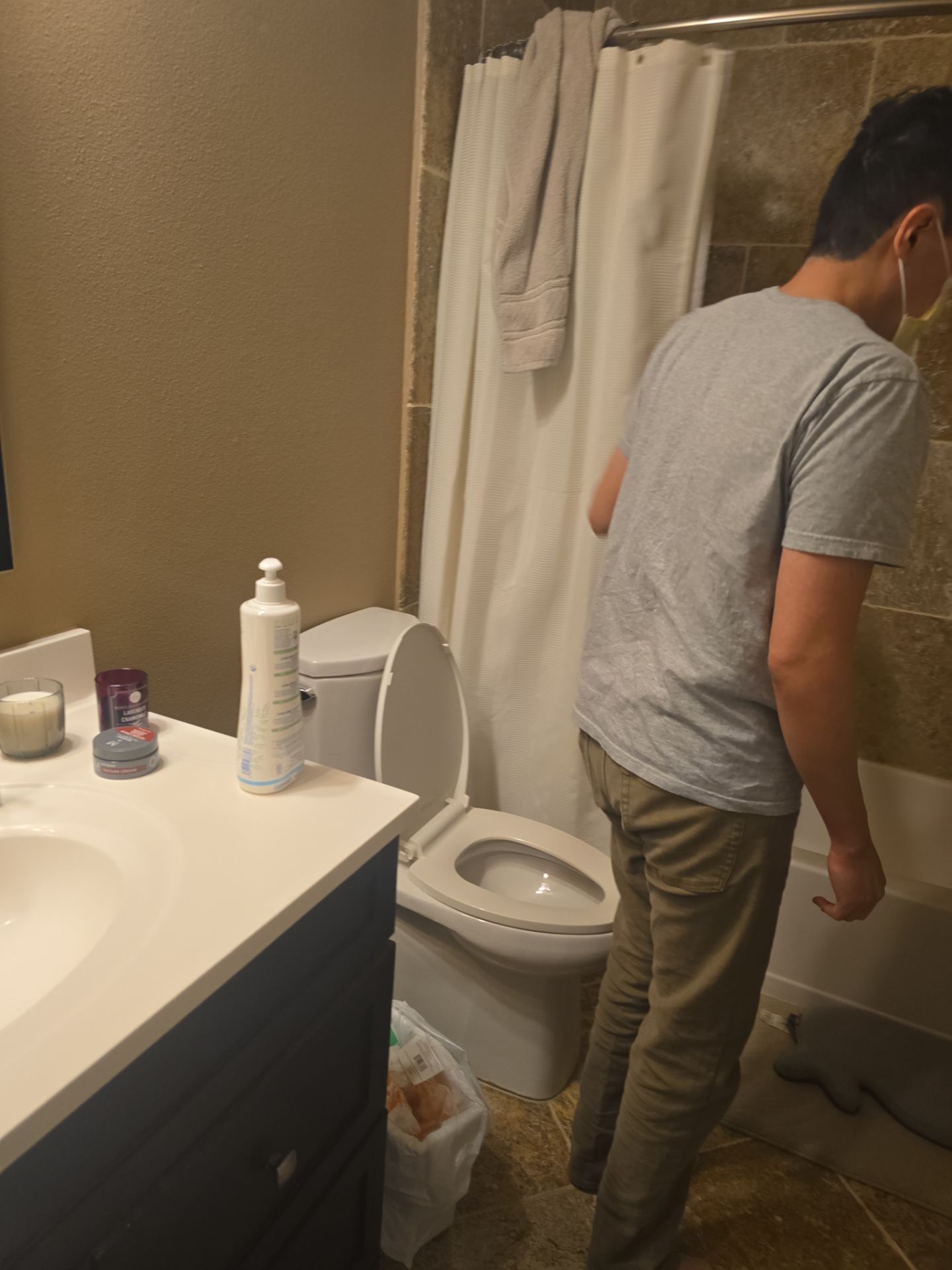 Inspecting Water Leak in Shower by Us Plumbing