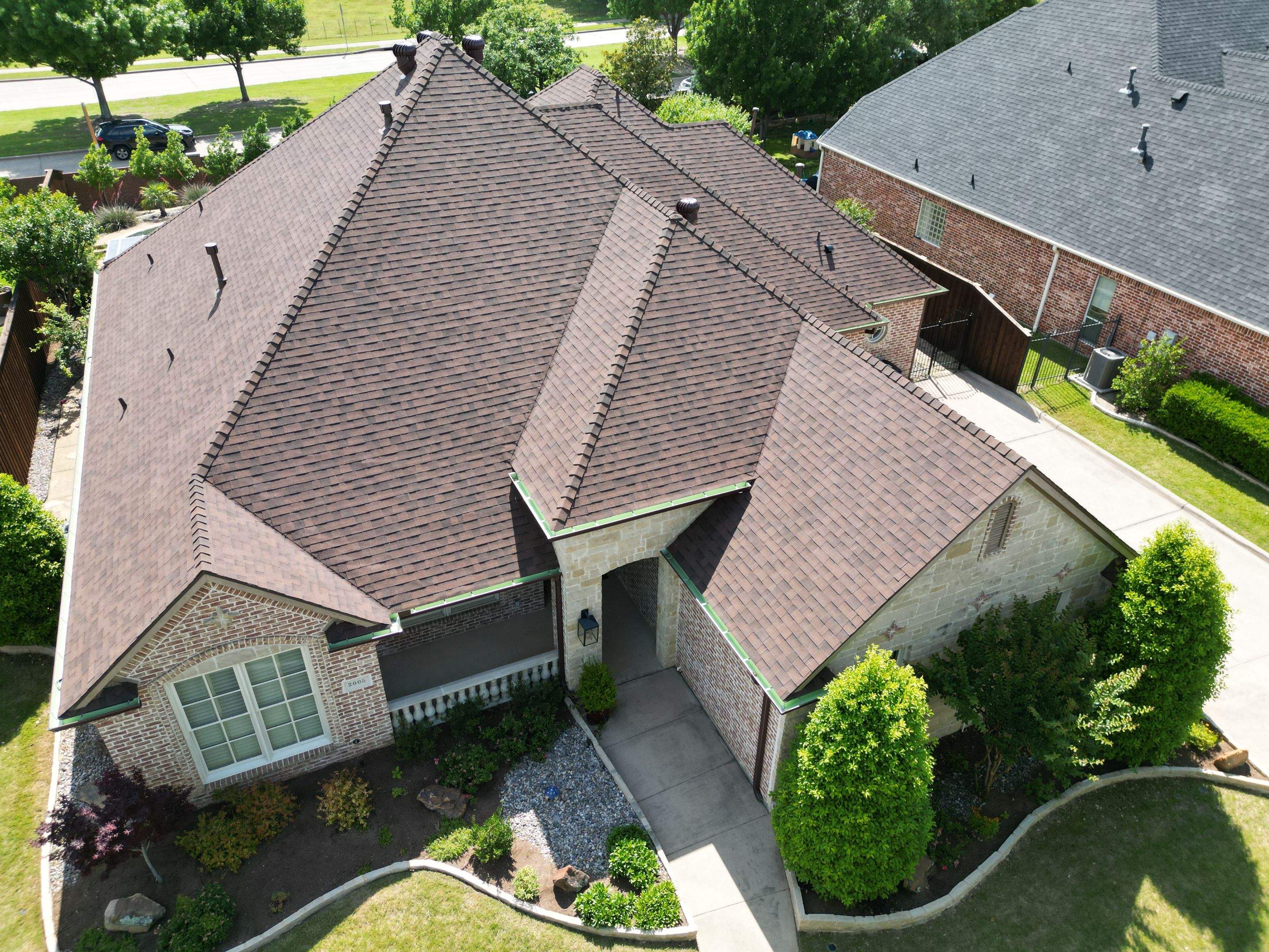 Residential Roofing Installation using Malarkey Legacy Scotchgard Shingles by Harvey Roofing & Construction