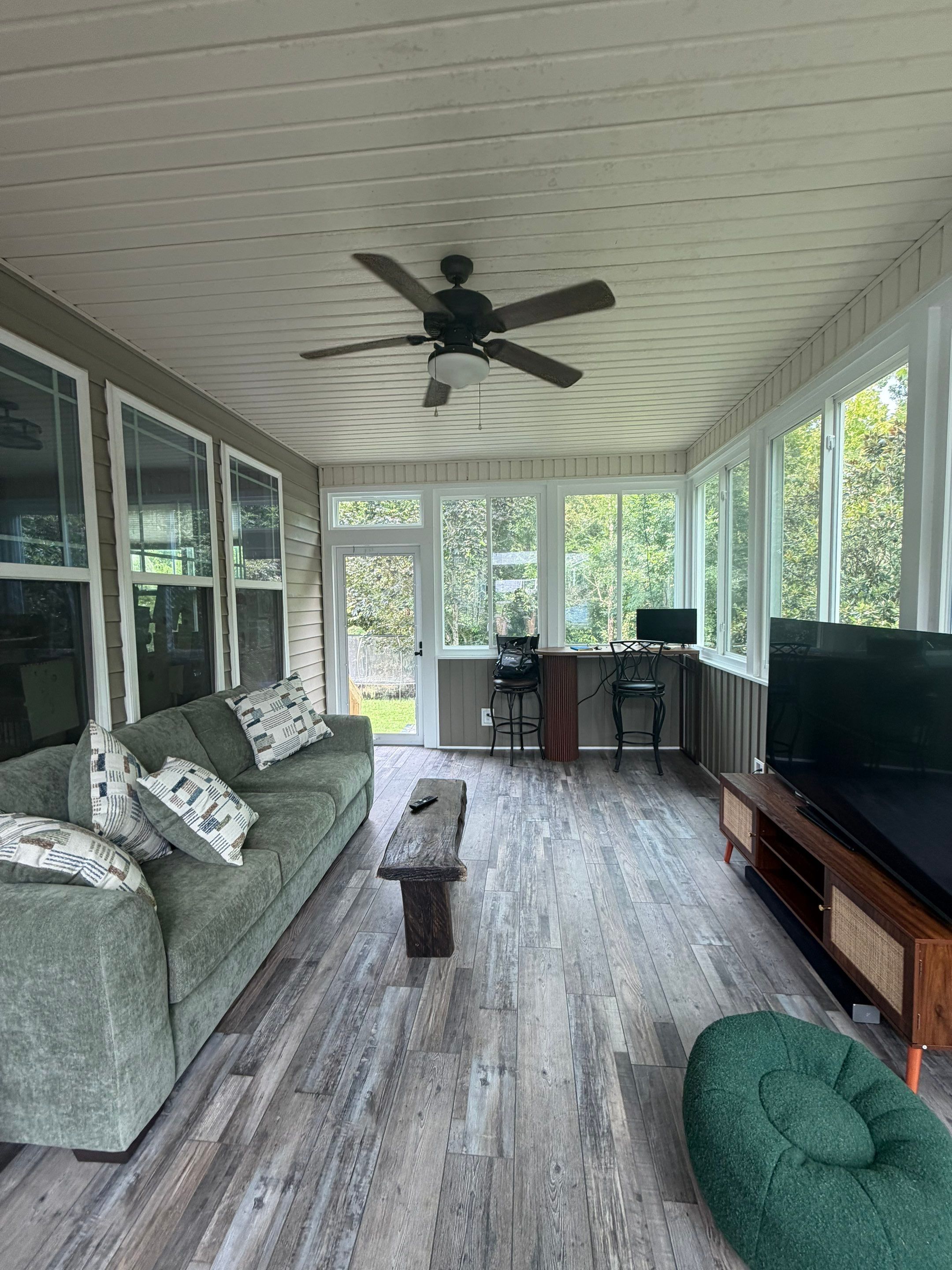 Custom Sunroom Conversion and Screened Porch Addition in Wake Forest by The Remodeling Company