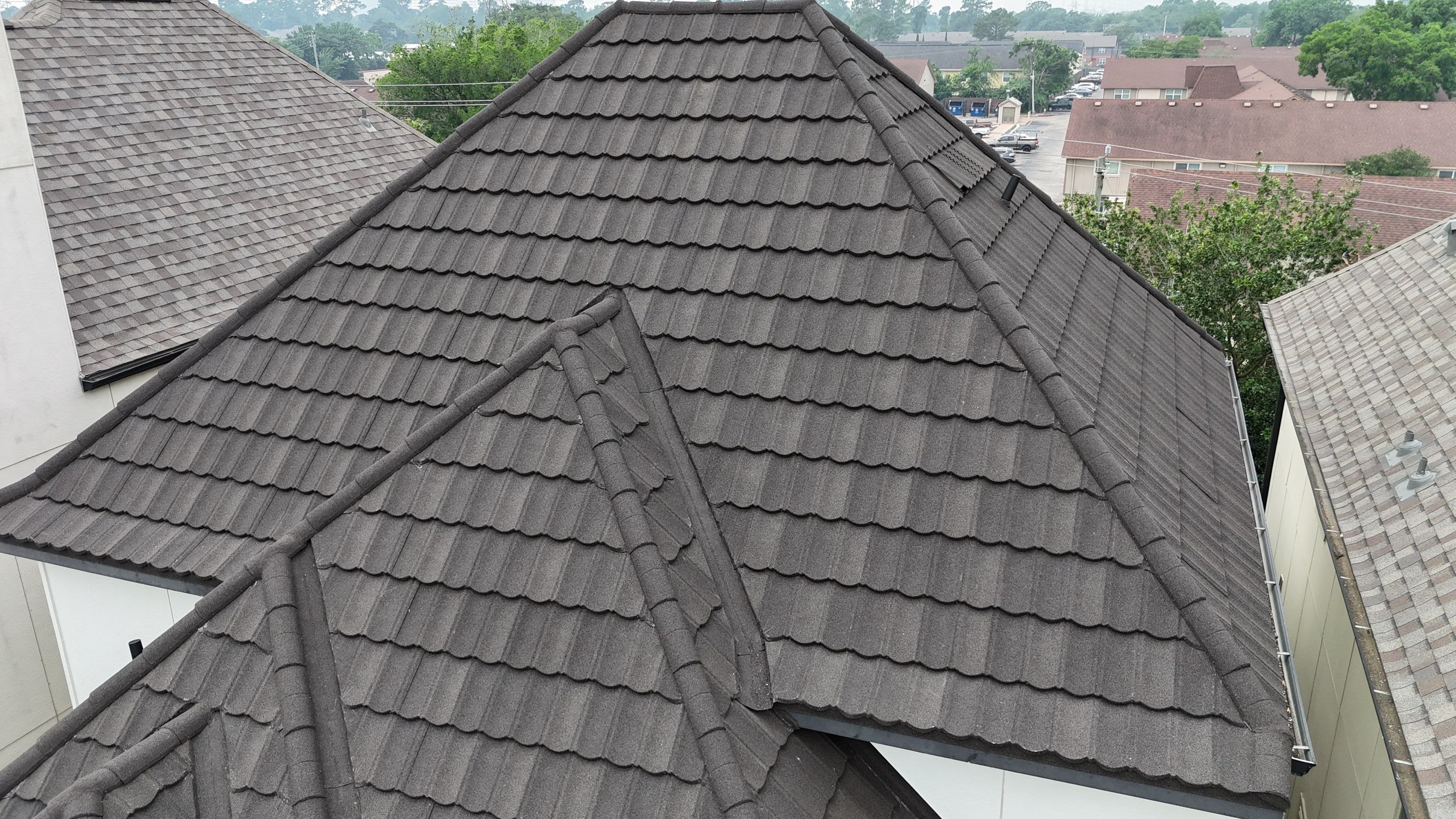 Stunning transformation from Shingles to DECRA Tile by Core Four Roofing