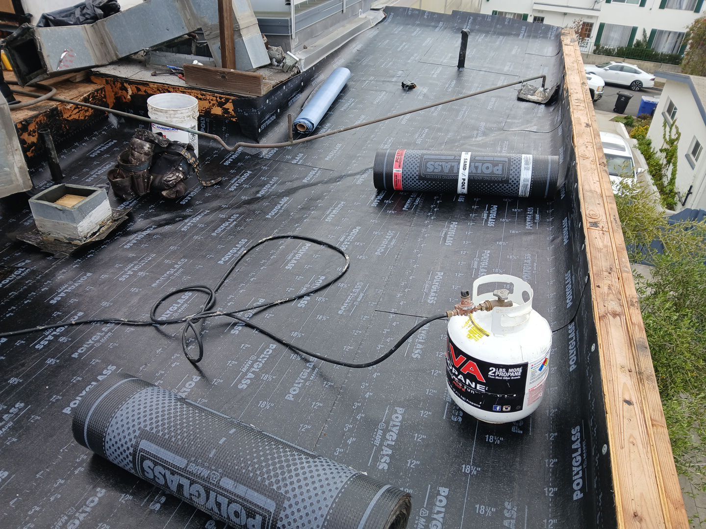 Residential Roofing Installation using Polyglass Torch Down Roofing System by Hull Brothers Roofing