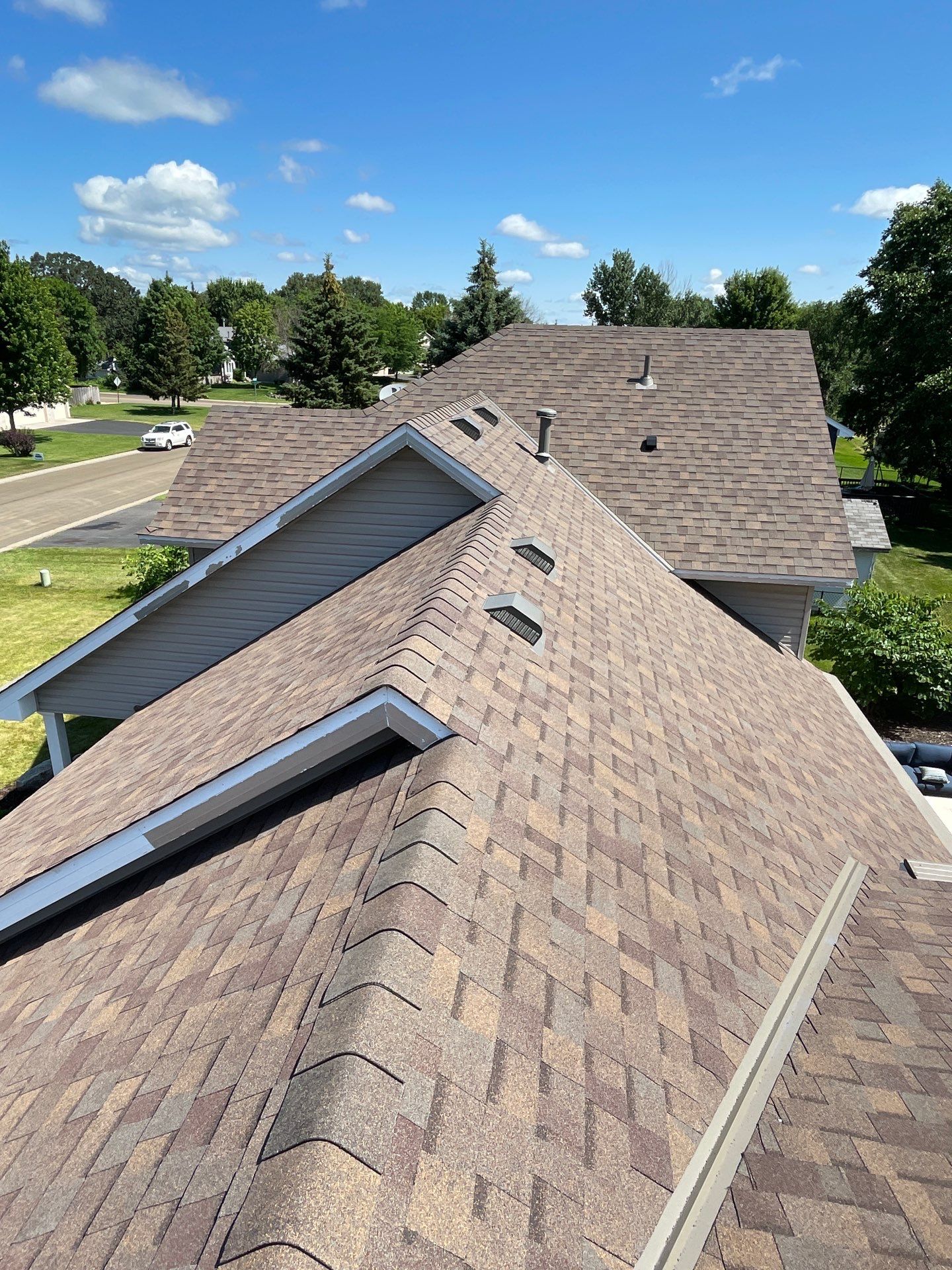 Hail Damage Roof Replacement – Owens Corning Duration in Teak | Andover, MN by First Impressions Exteriors
