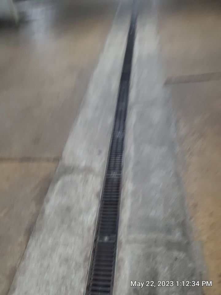 Parking garage using Hot water by Northern Power Washing LLC.