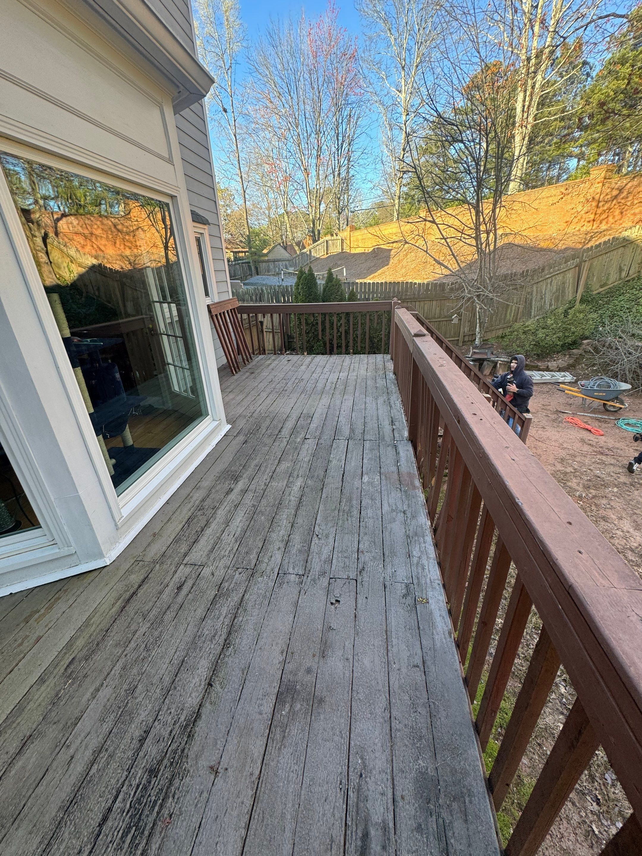 Elevated Deck Replacement with Black Metal Railings in Johns Creek by Swift Home Renovations