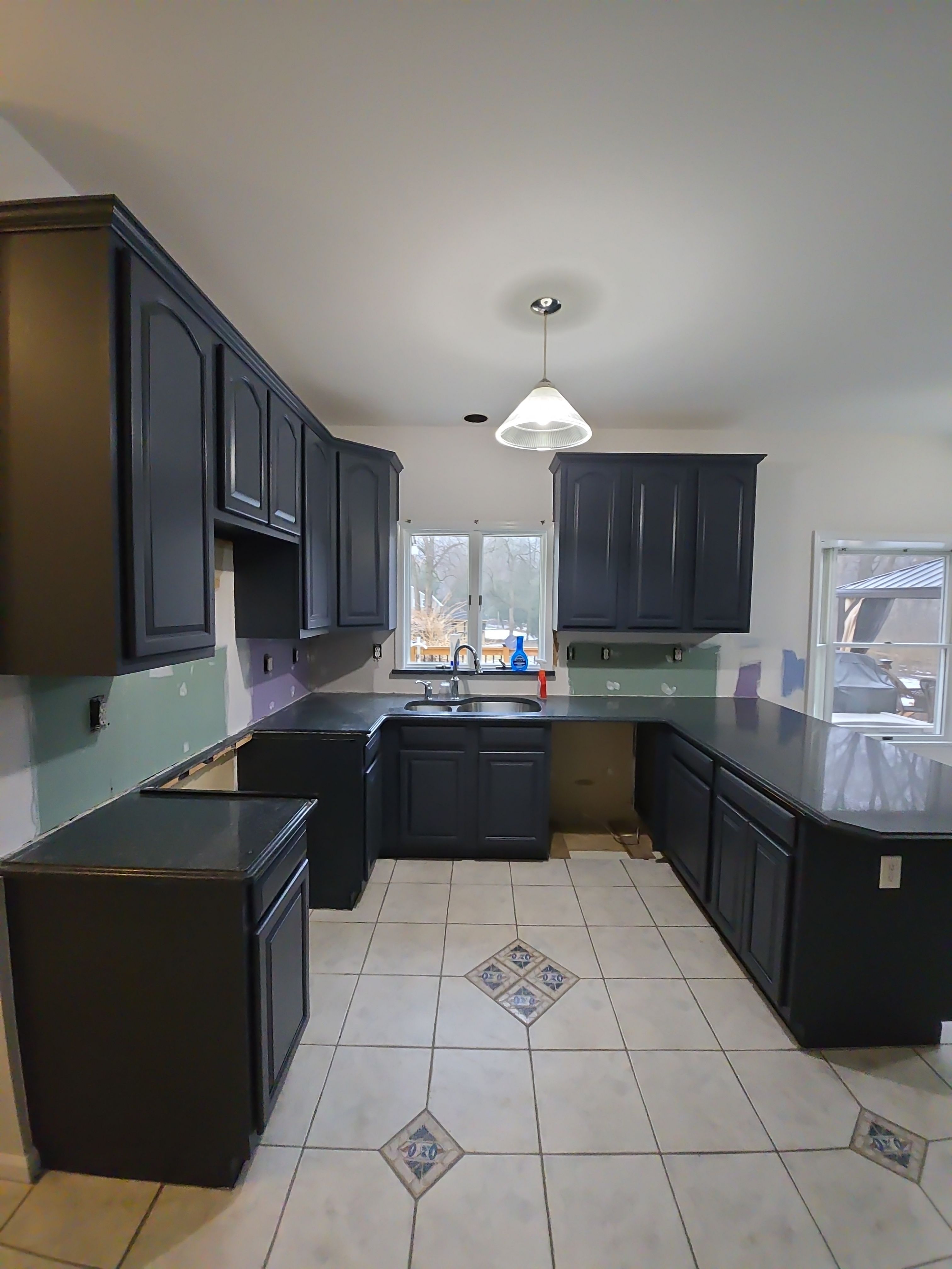 Cabinet Refinishing using Benjamin Moore Command by Spectrum Painting, LLC