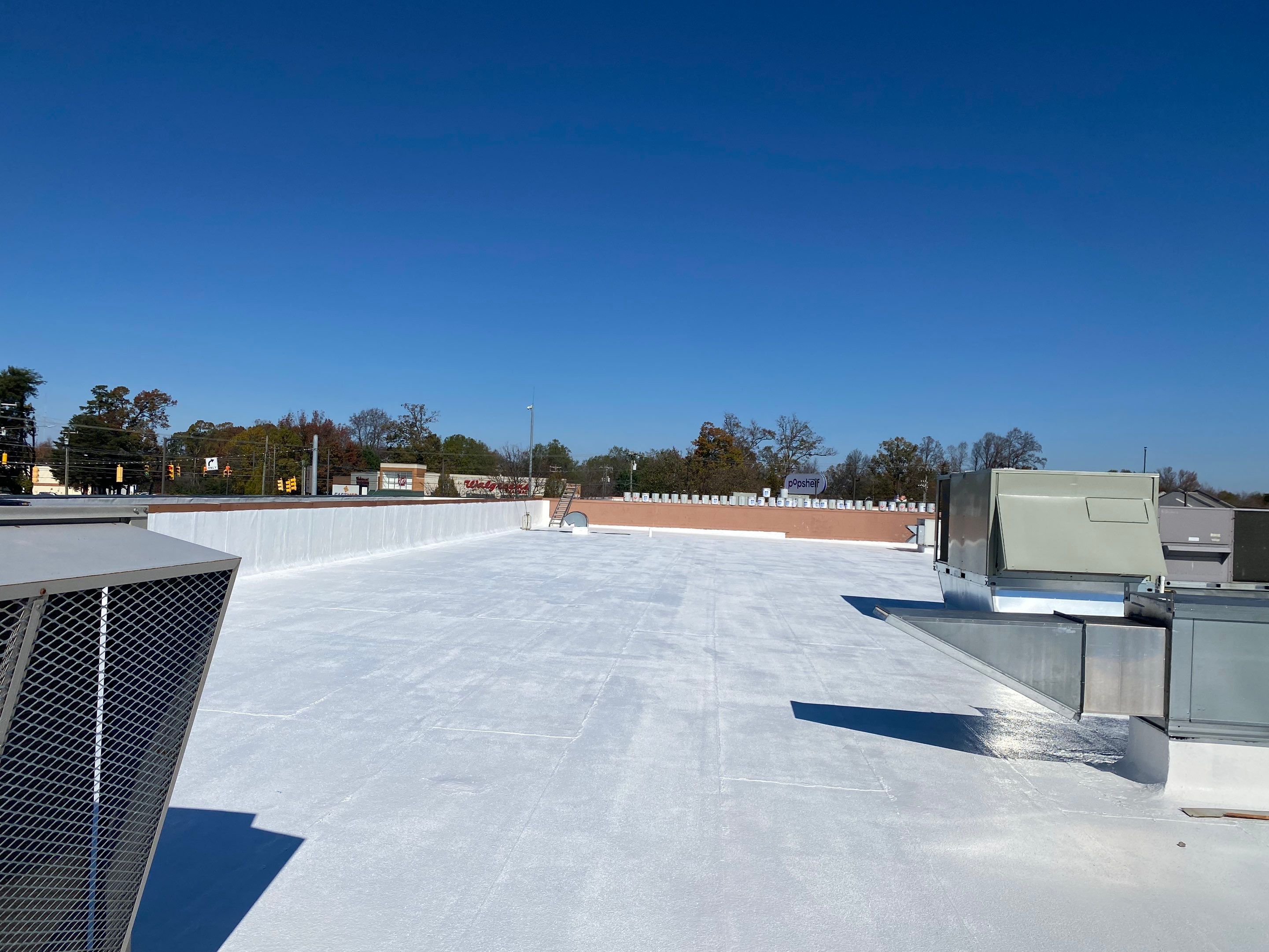 Commercial Coating using Poly Urerthane and Silicone Coating by Just In Time Roofing and Restoration