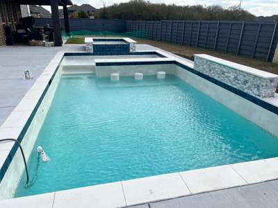 Geometric Pool with Raised Spa and Tanning Ledge